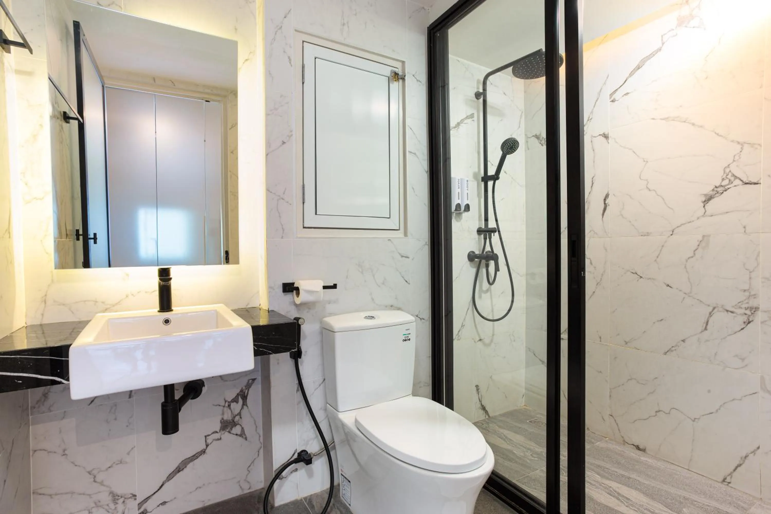 Toilet in BOOK Design Hotel