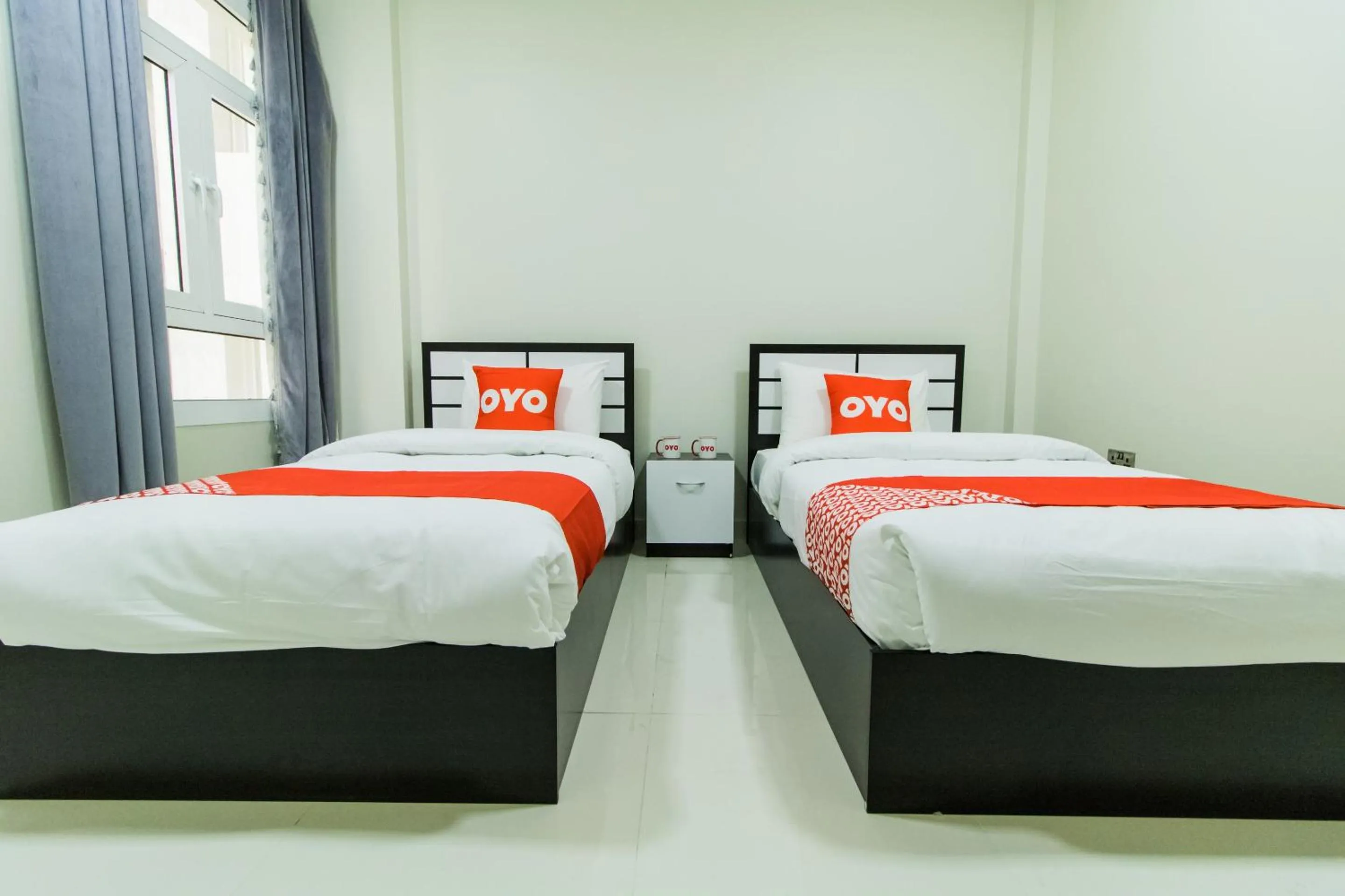 Bedroom, Bed in Super OYO 106 Muscat Grand Hotel Apartment