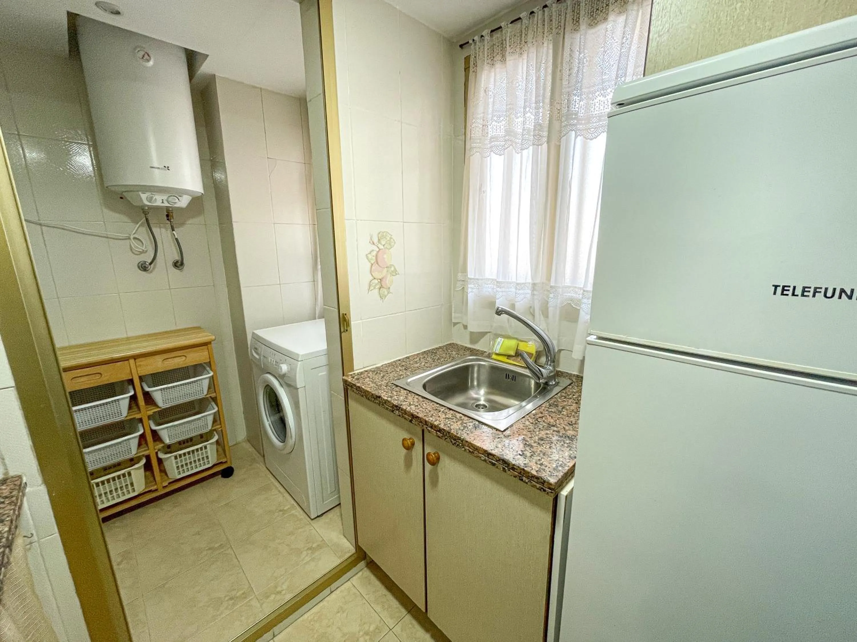 Kitchen or kitchenette in Apartamentos Neptuno Oropesa 3000
