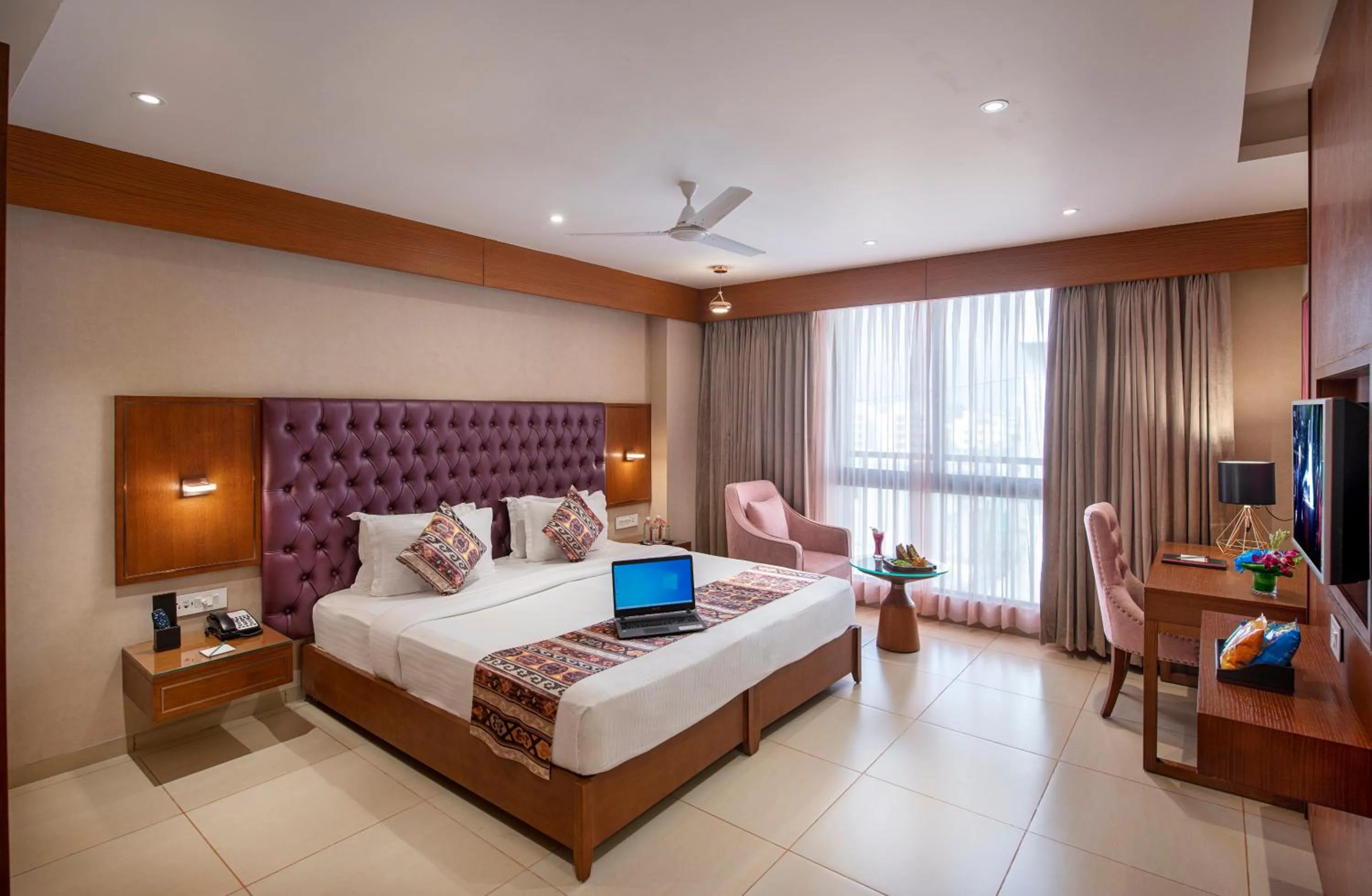 Photo of the whole room, Bed in SK Lords Inn Ahmedabad