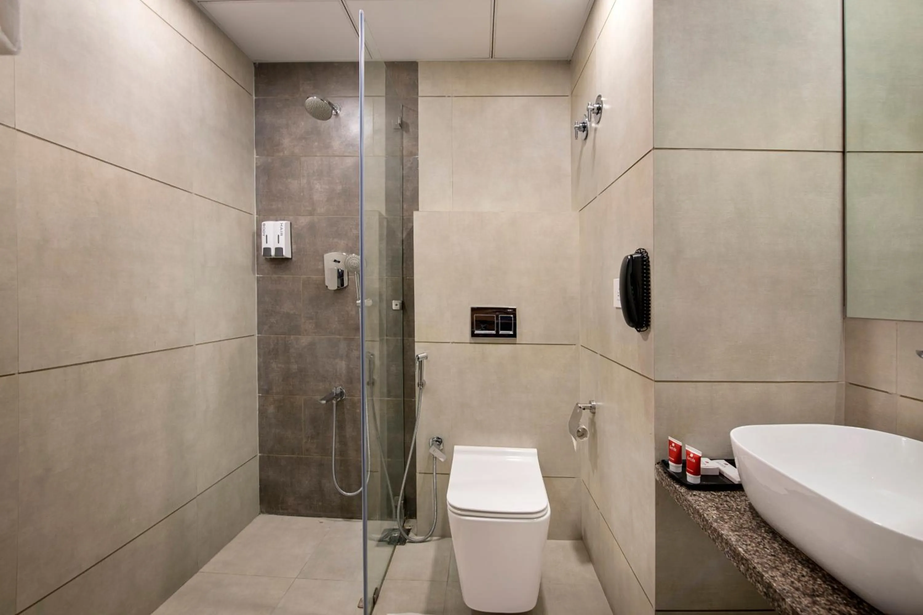 Bathroom in SK Lords Inn Ahmedabad