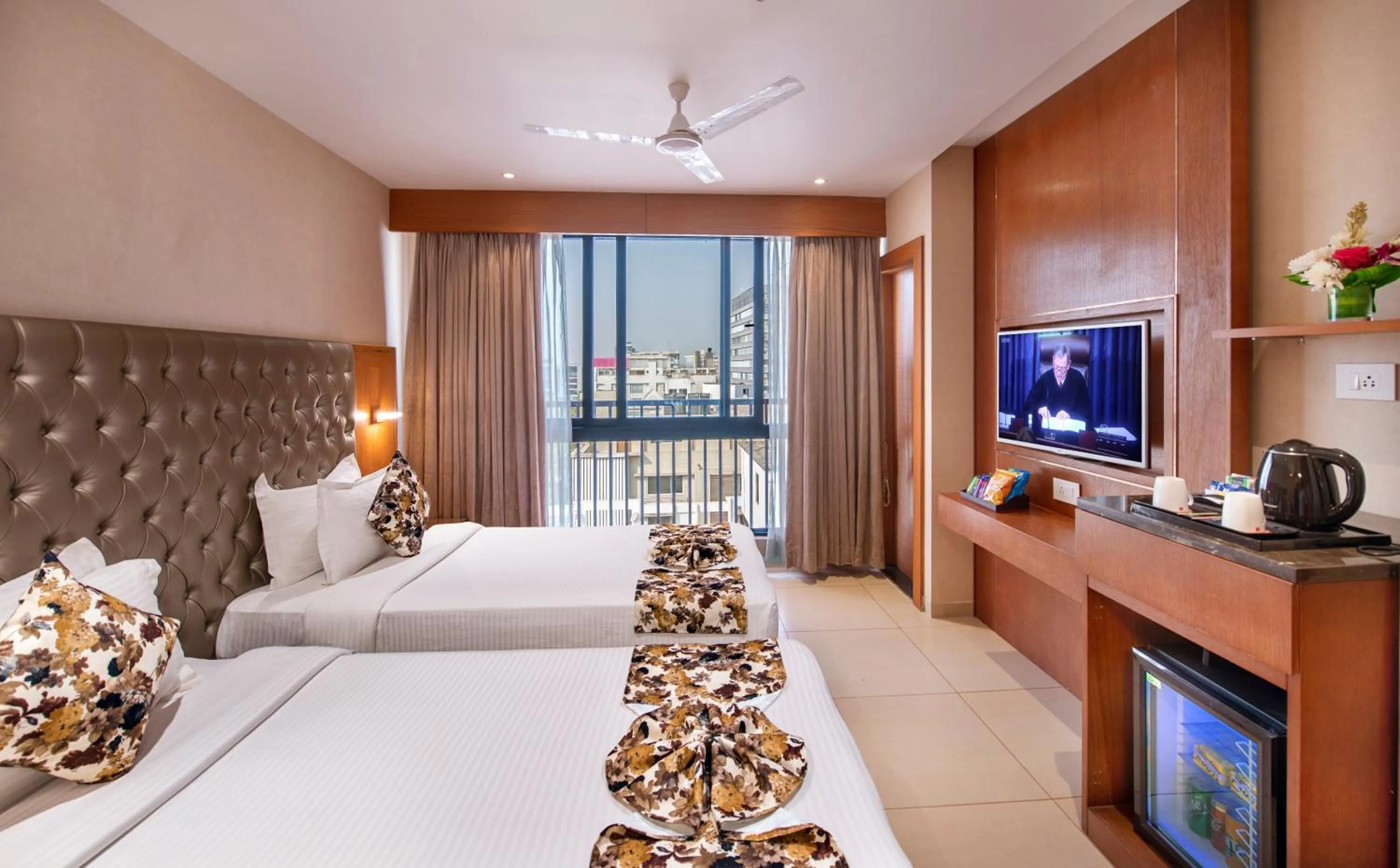 Photo of the whole room, Bed in SK Lords Inn Ahmedabad