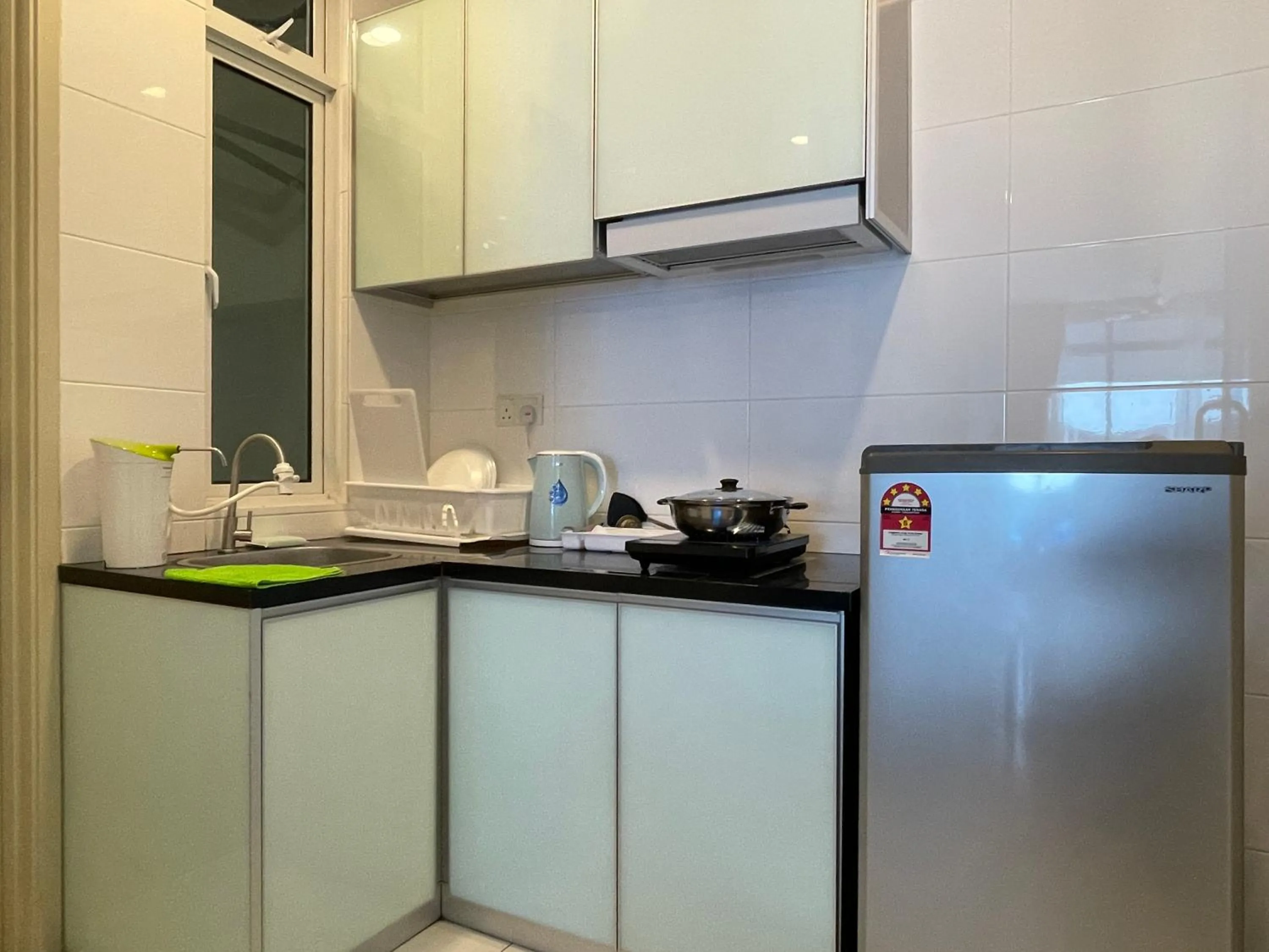 Kitchen or kitchenette in The Wave Suites Melaka