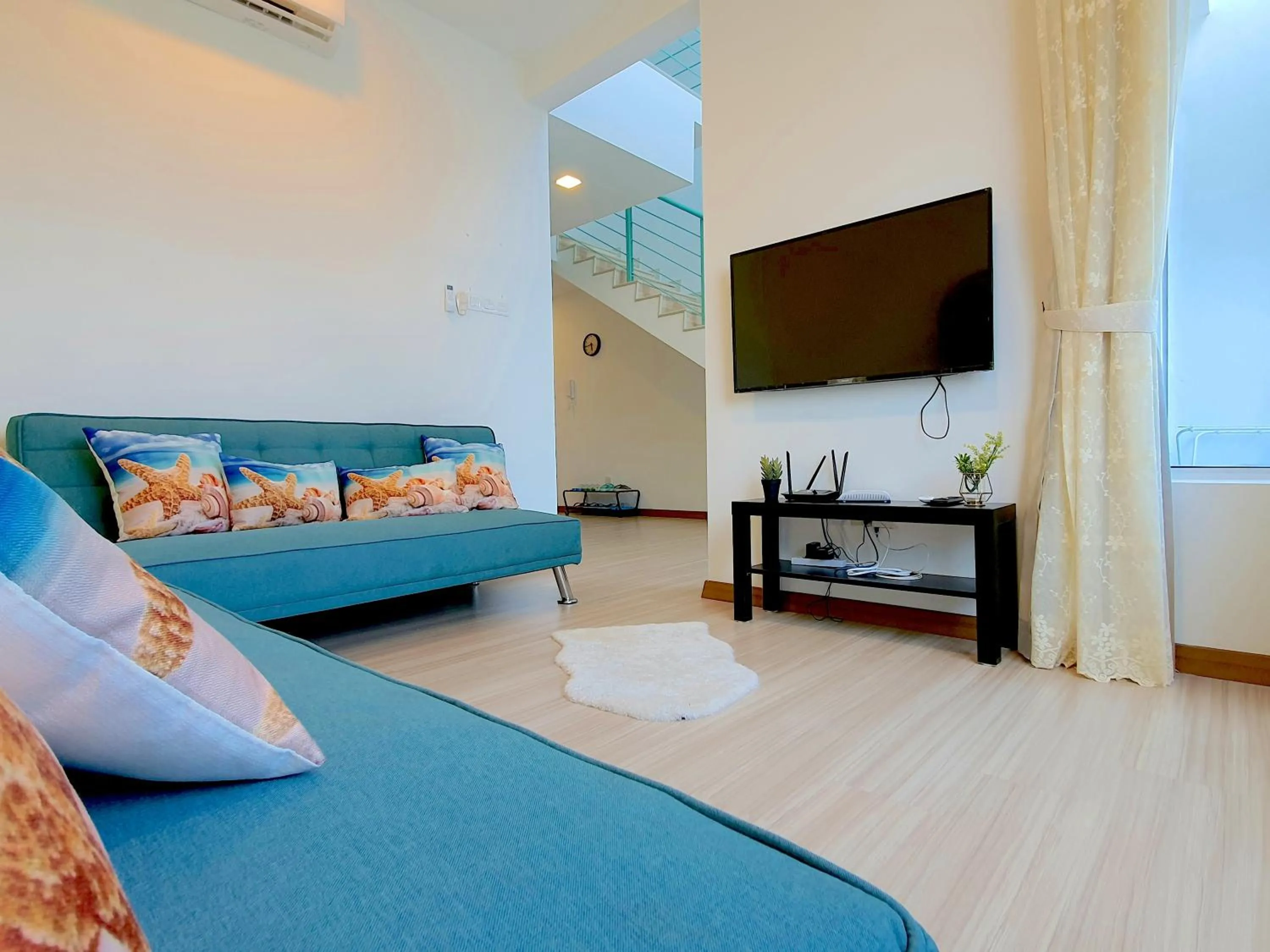 Living room, Bed in The Wave Suites Melaka