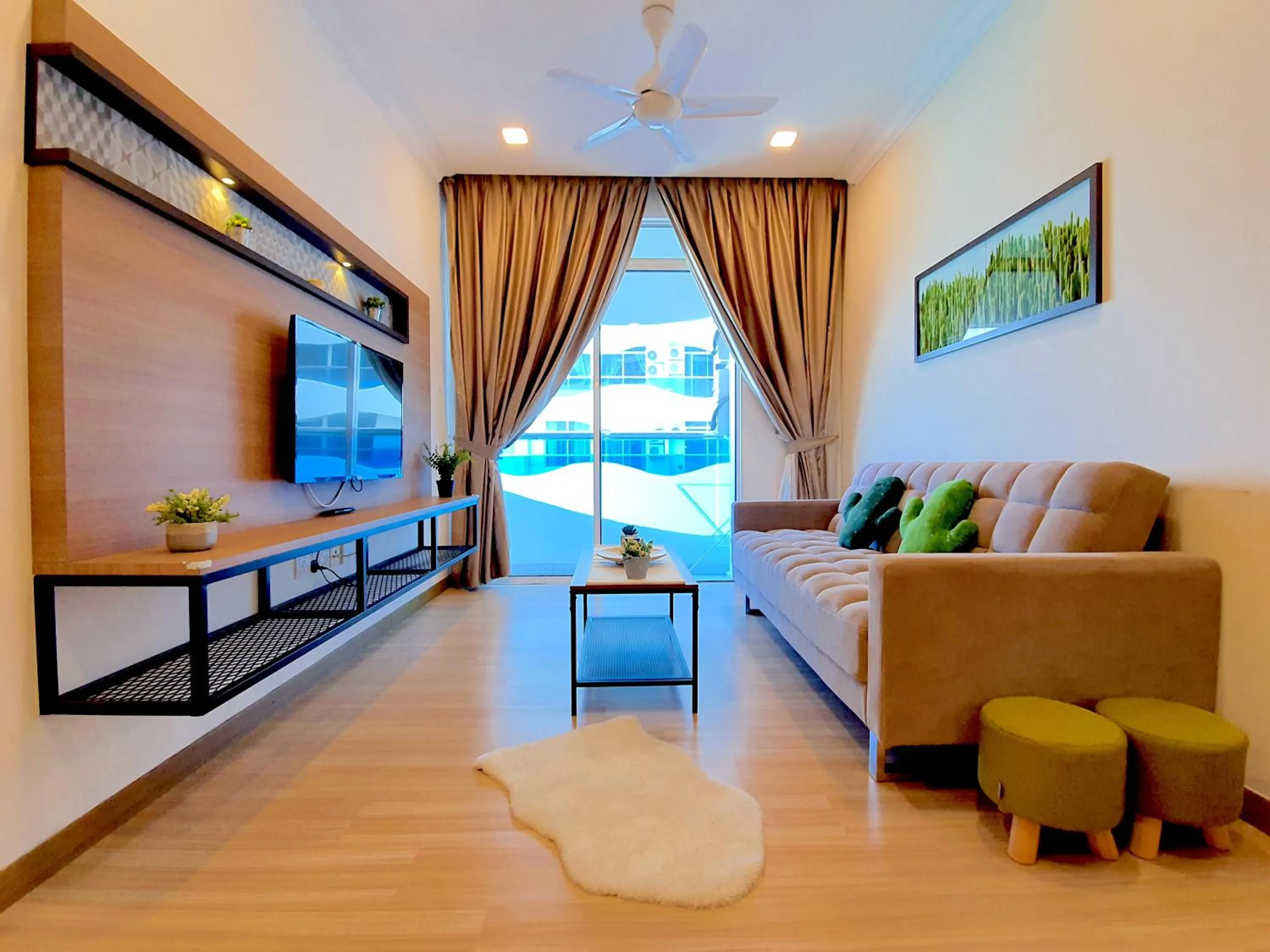 Living room, Bed in The Wave Suites Melaka