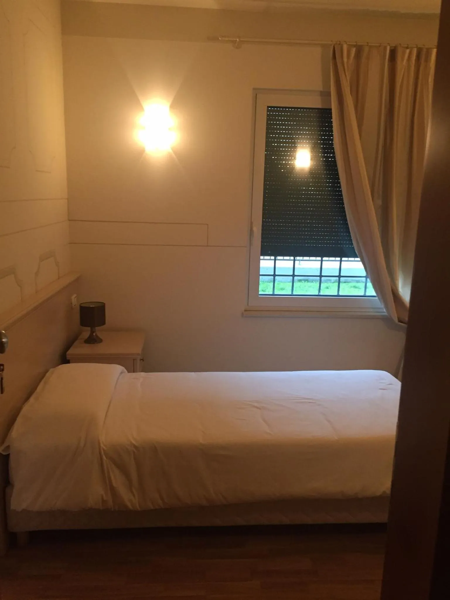 Photo of the whole room, Bed in Albergo La Quiete