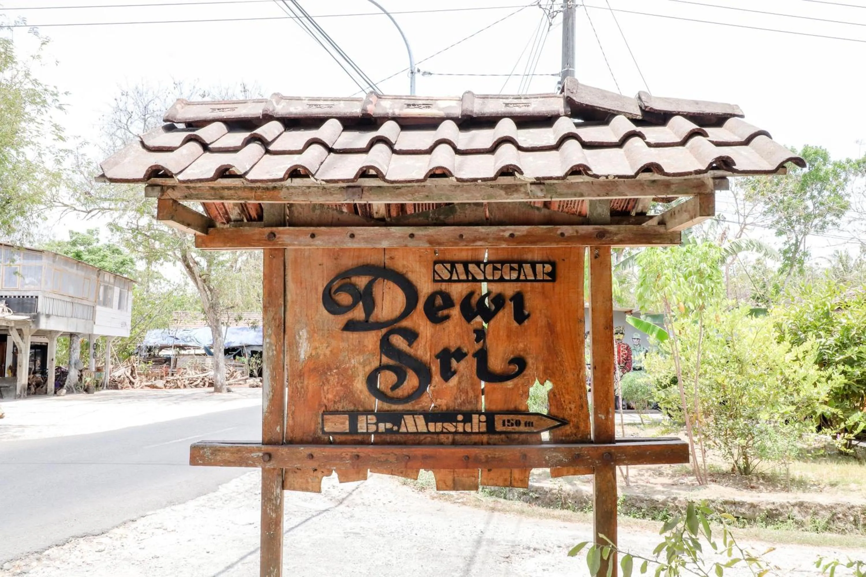 Property logo or sign in Dewisri Homestay