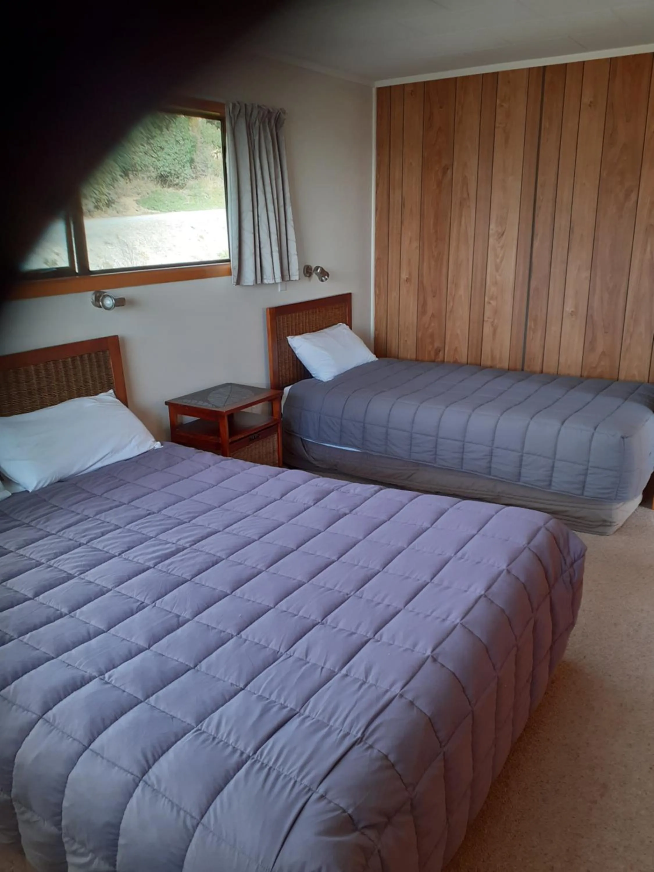 Bed in Moeraki Beach Motels