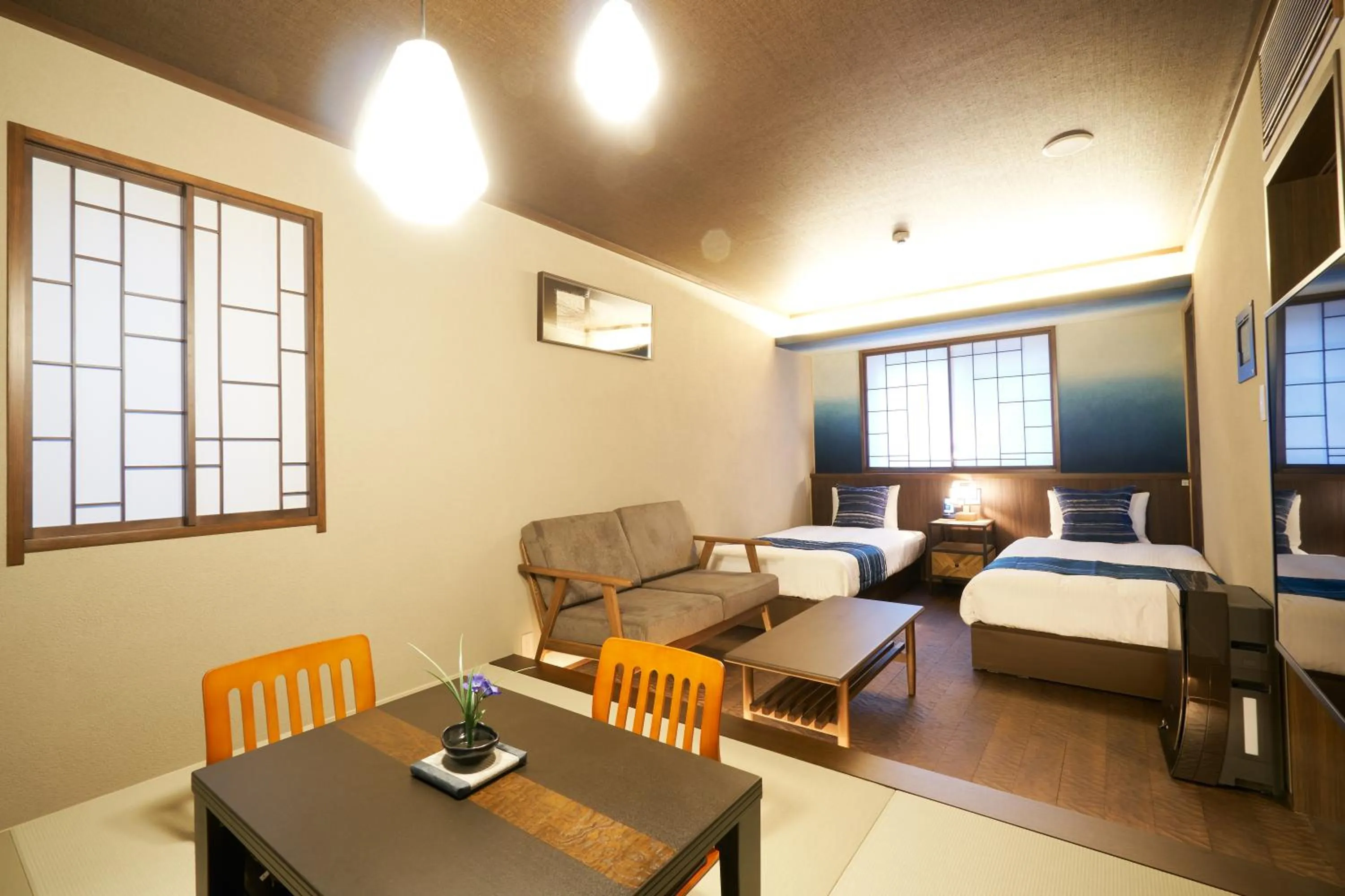 Seating area, Bed in プライベートホテル 四季の彩