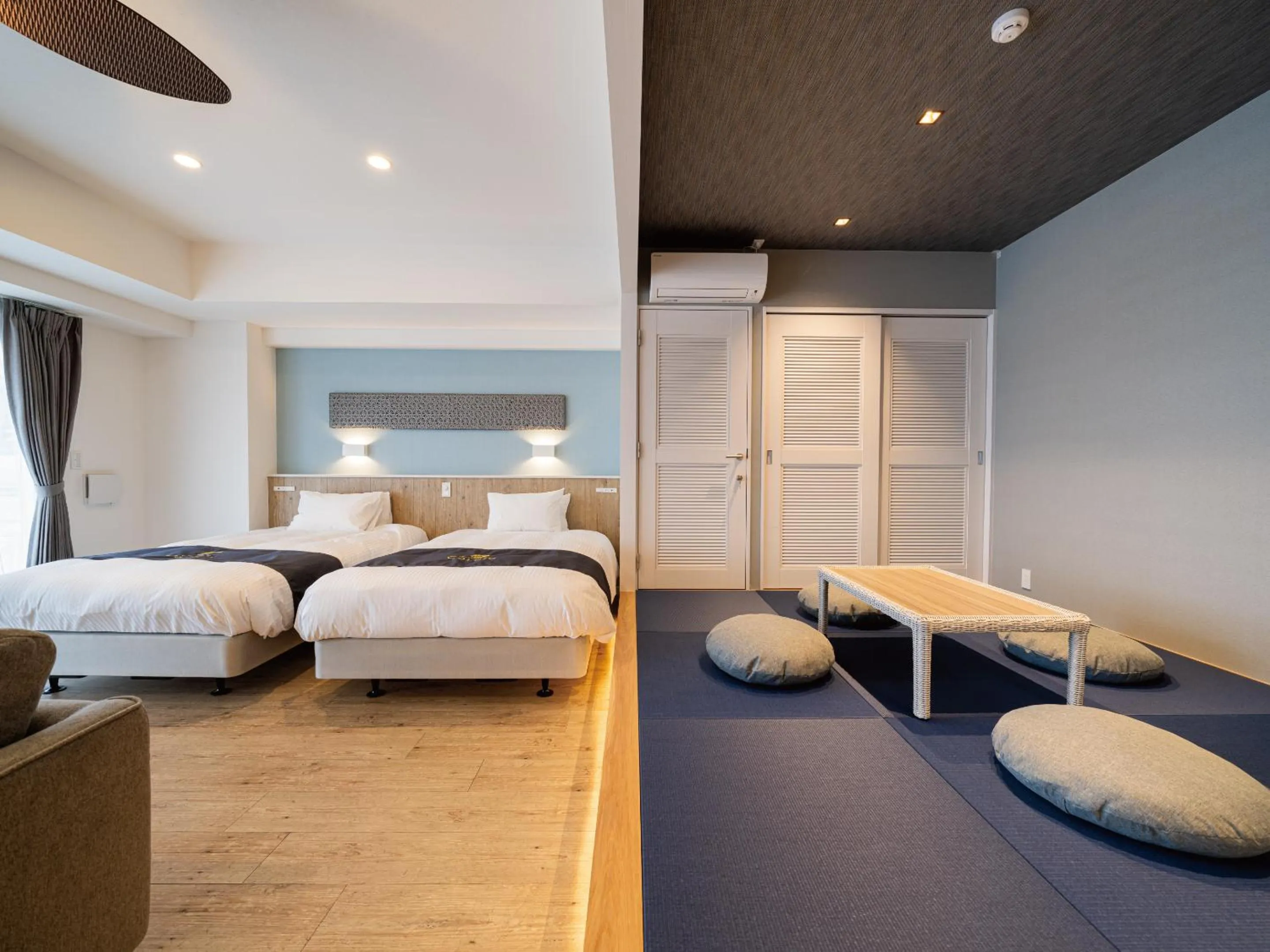 Photo of the whole room, Bed in Aqua Palace Chatan by Coldio Premium