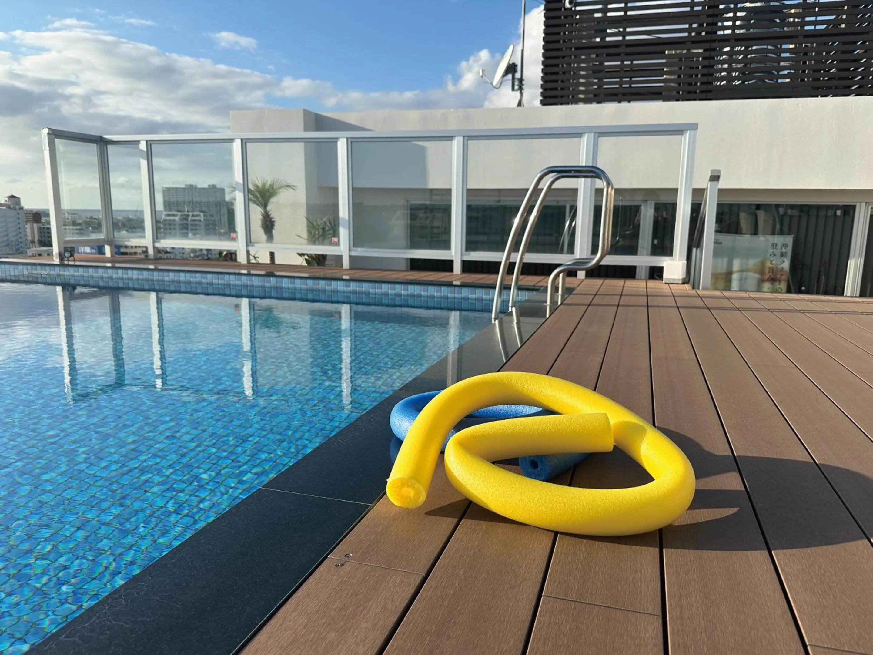 Pool view in Aqua Palace Chatan by Coldio Premium