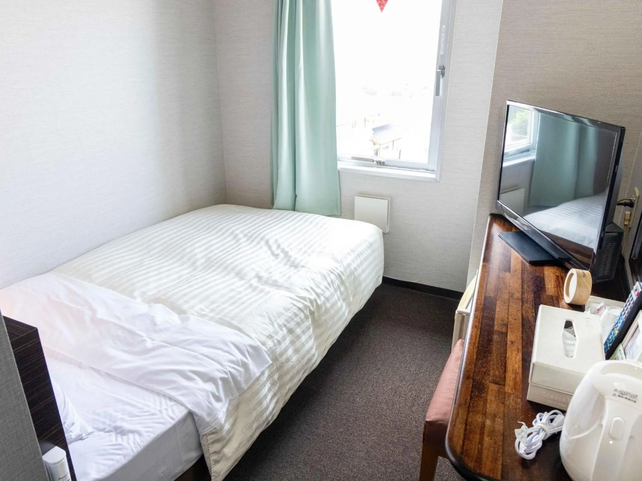 Bed in Super Hotel Matsusaka