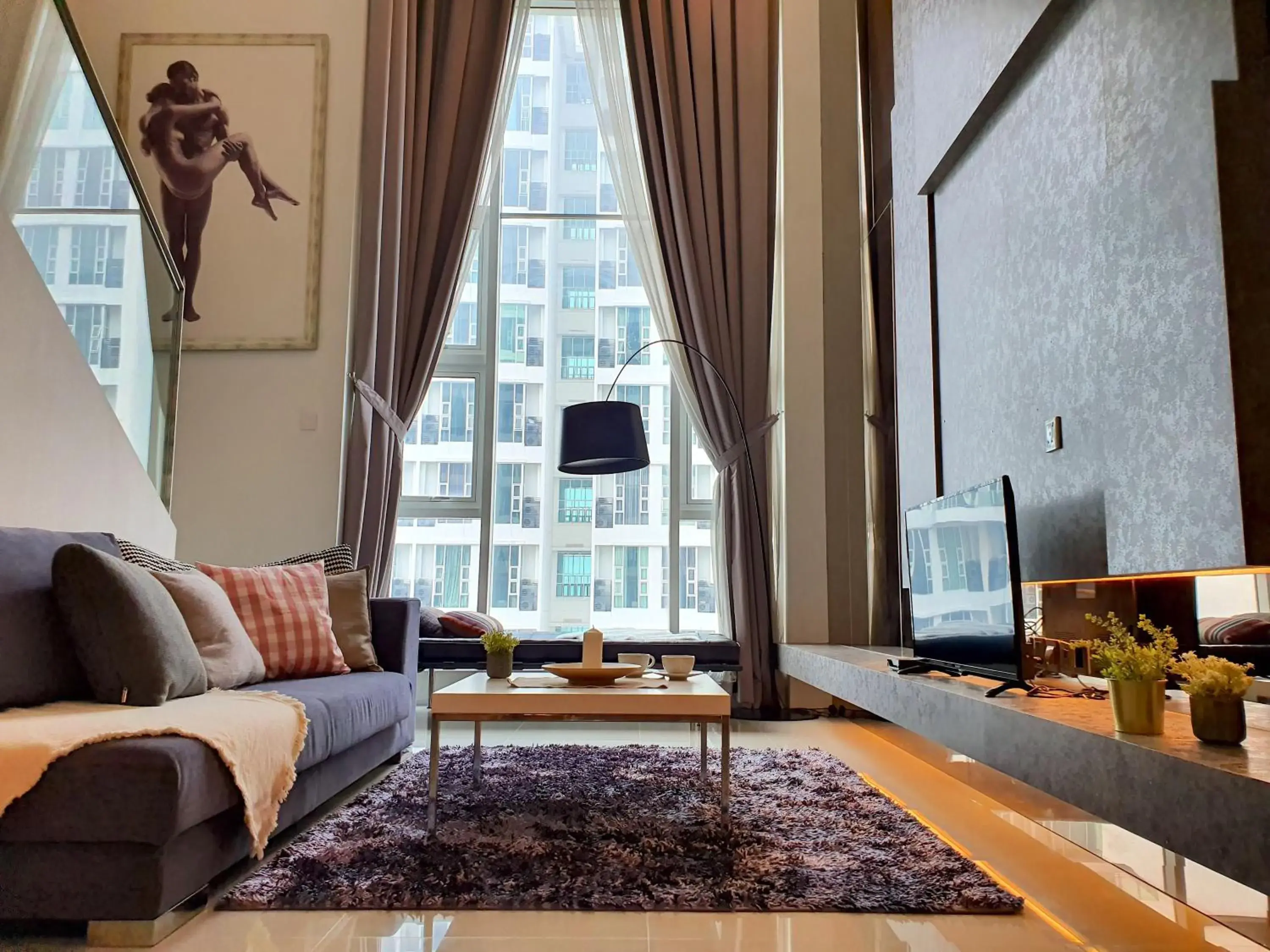 Living room in The Scott Garden Kuala Lumpur by BeeStay Management Living room in The Scott Garden Kuala Lumpur by BeeStay Management