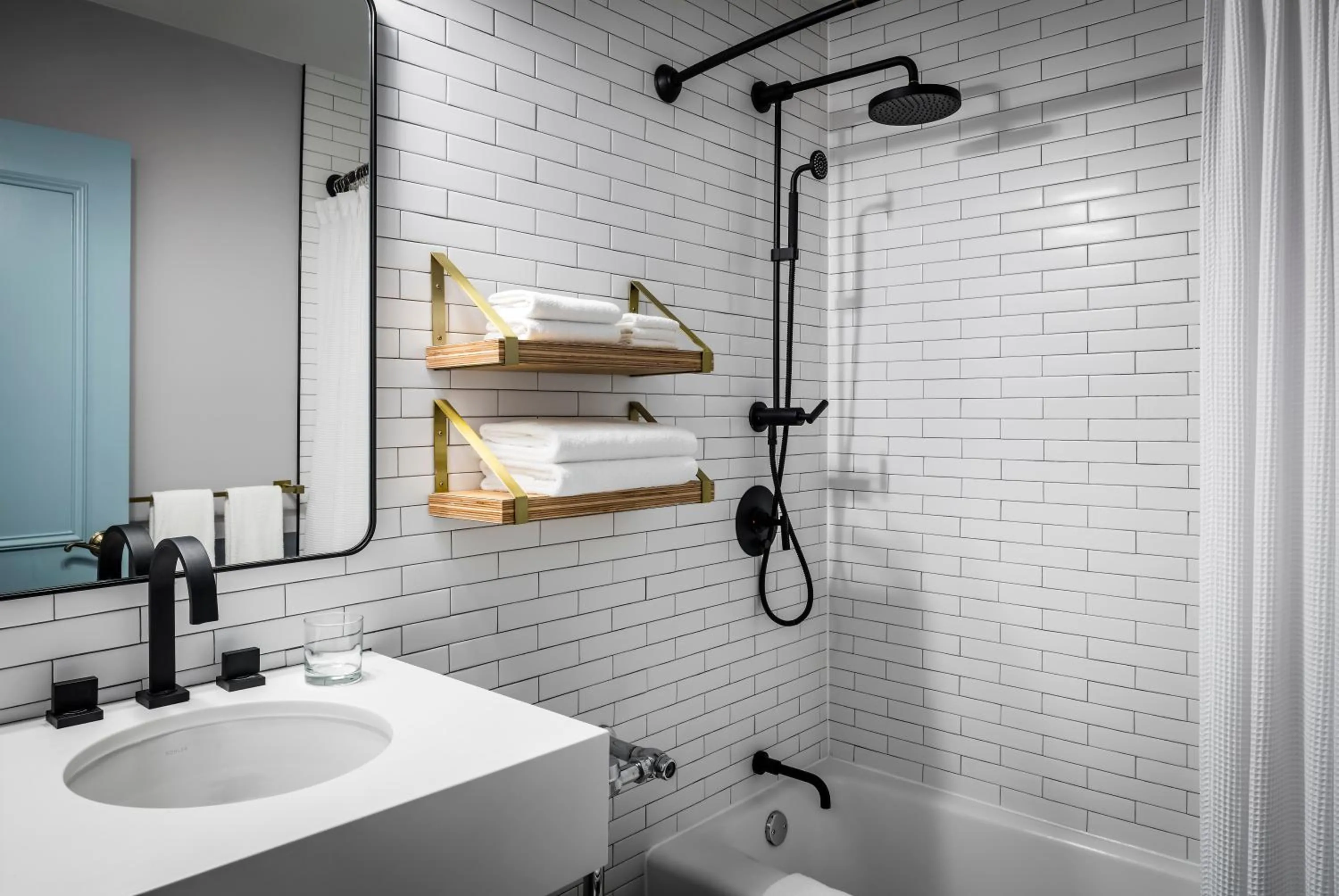 Shower in Freepoint Hotel Cambridge, Tapestry Collection by Hilton