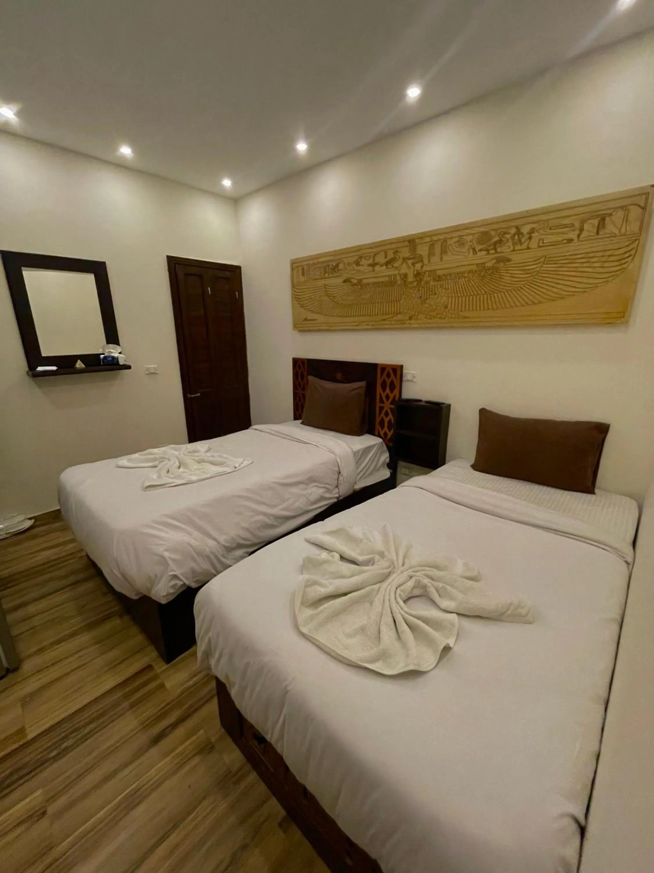 Bed in Sahara Pyramids Inn