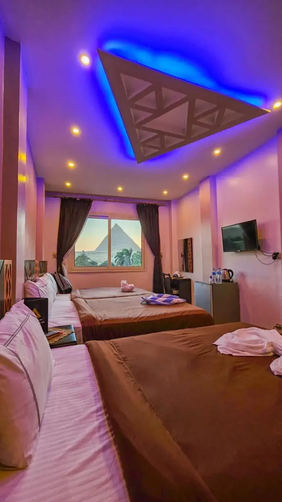 Deluxe Triple Room With Pyramids View - single occupancy in Sahara Pyramids Inn Deluxe Triple Room With Pyramids View - single occupancy in Sahara Pyramids Inn