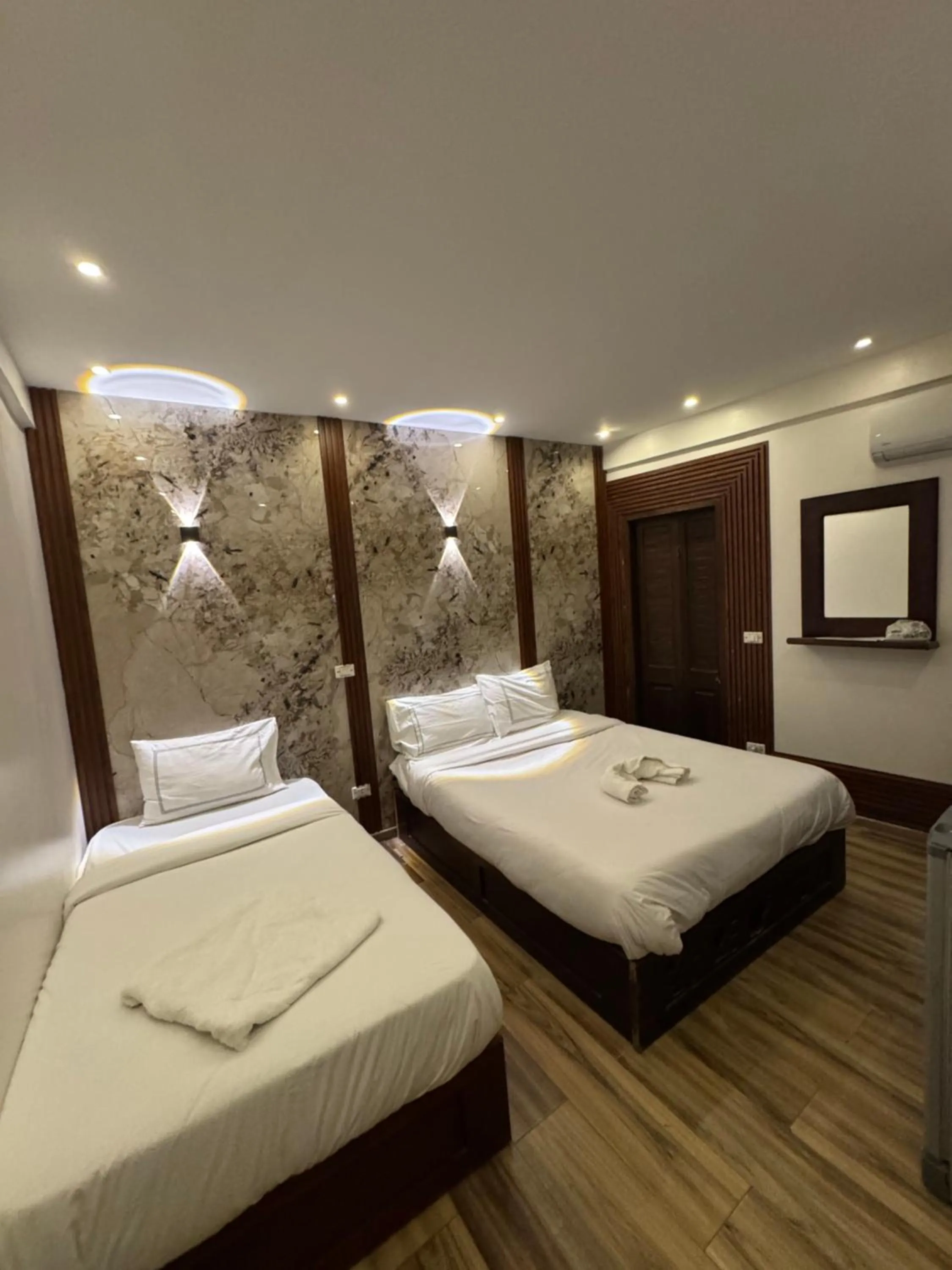 Bed in Sahara Pyramids Inn