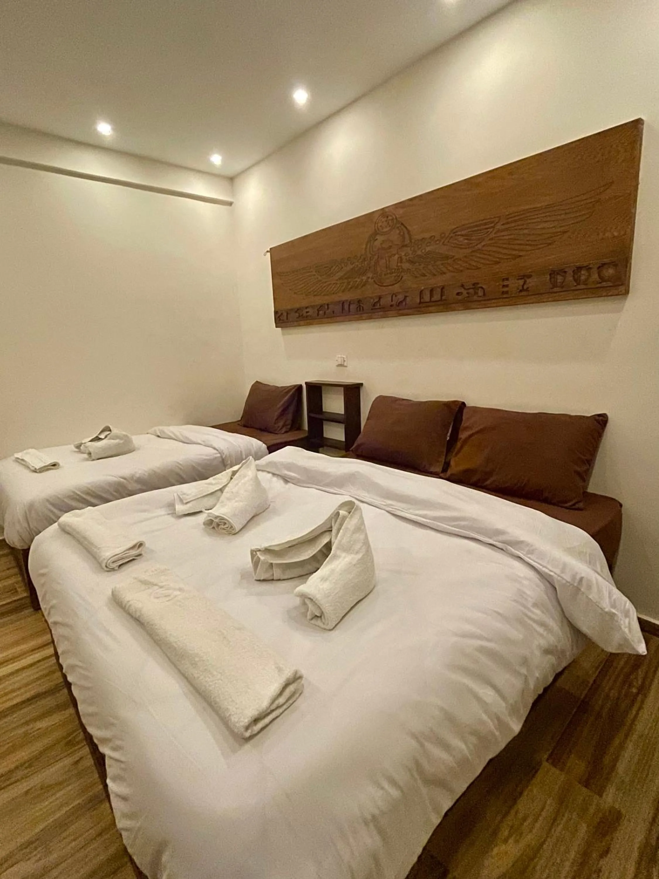 Bed in Sahara Pyramids Inn