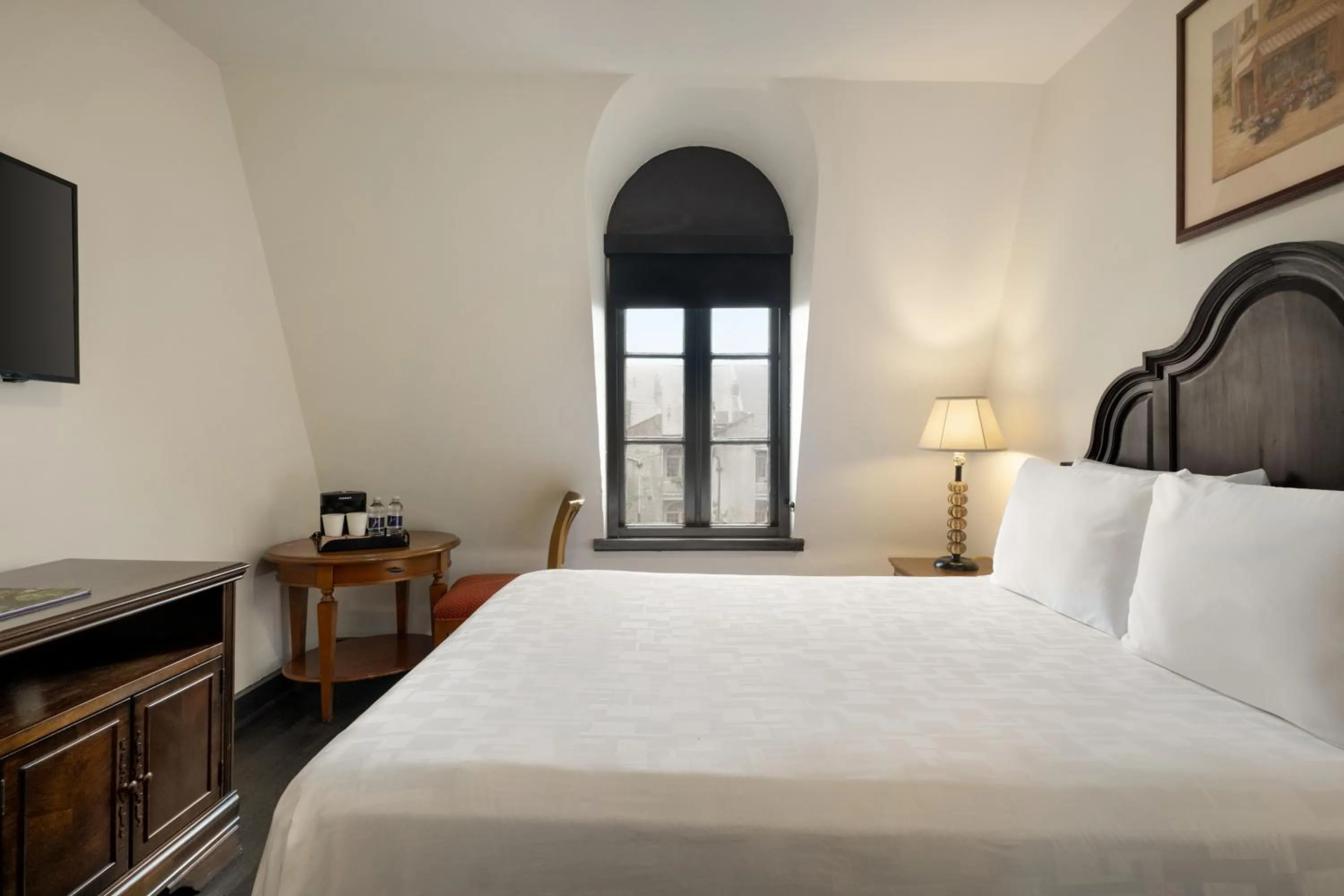 Bed in Le Richelieu Hotel in the French Quarter