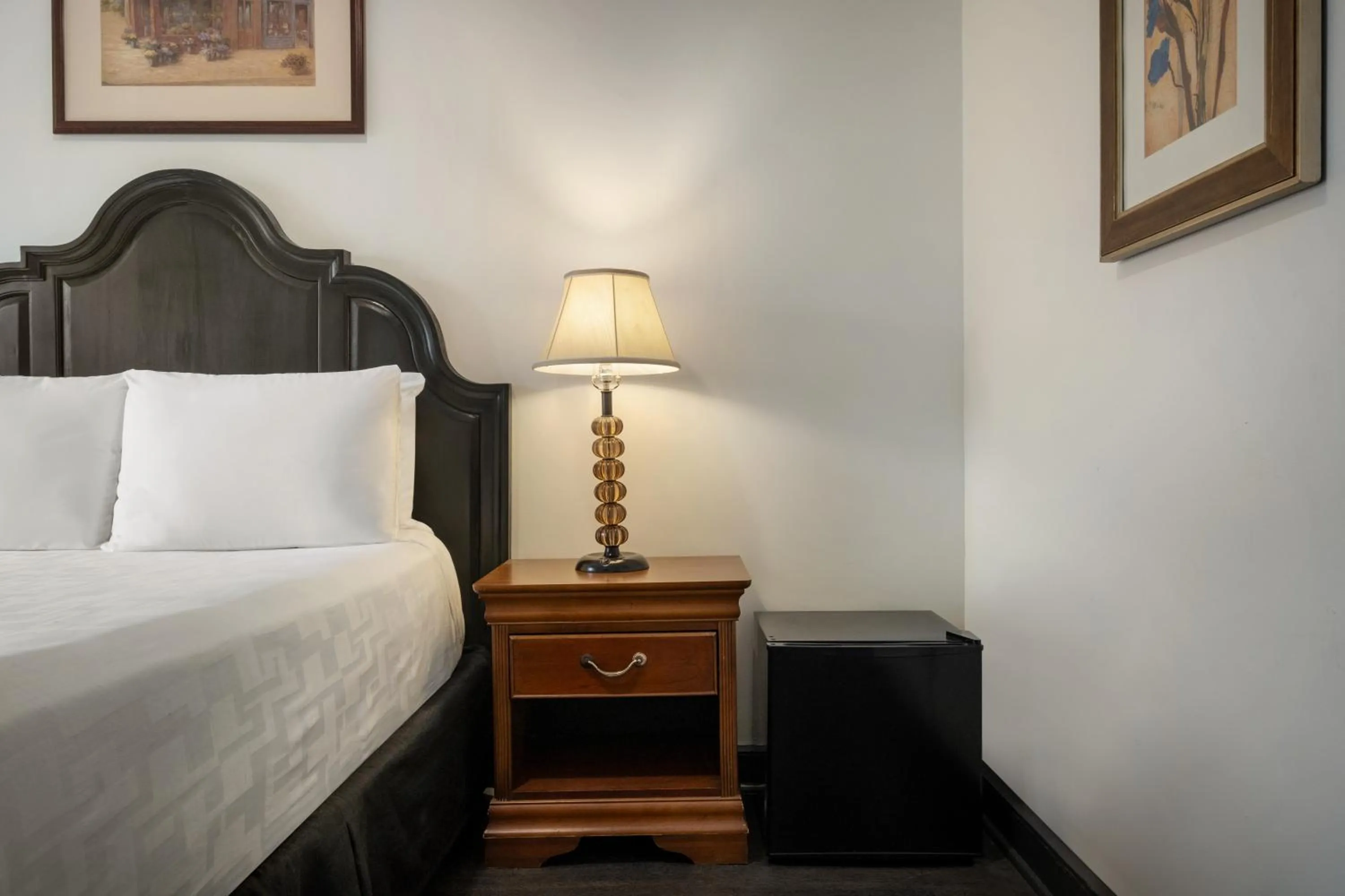 Bed in Le Richelieu Hotel in the French Quarter