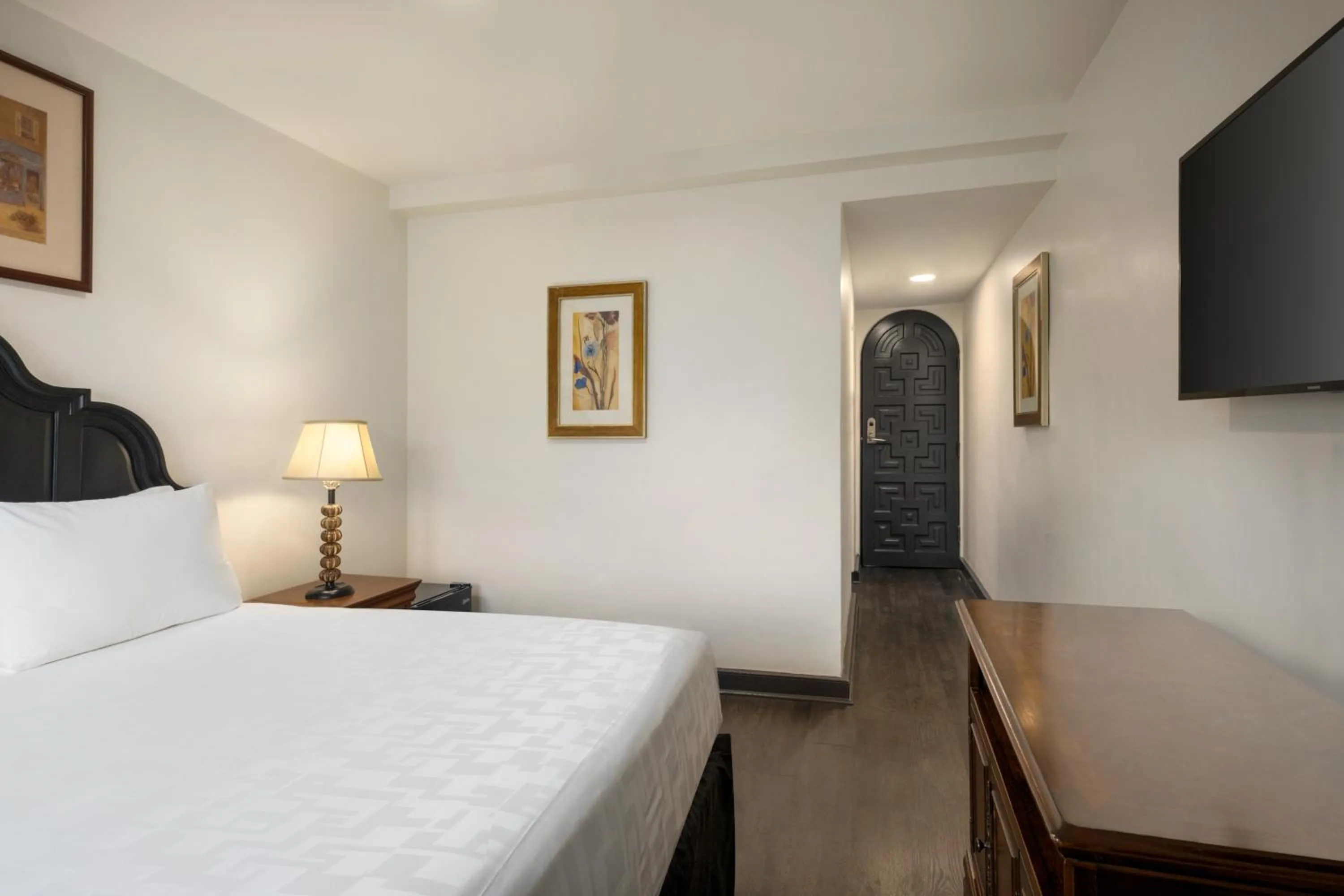 Bed in Le Richelieu Hotel in the French Quarter