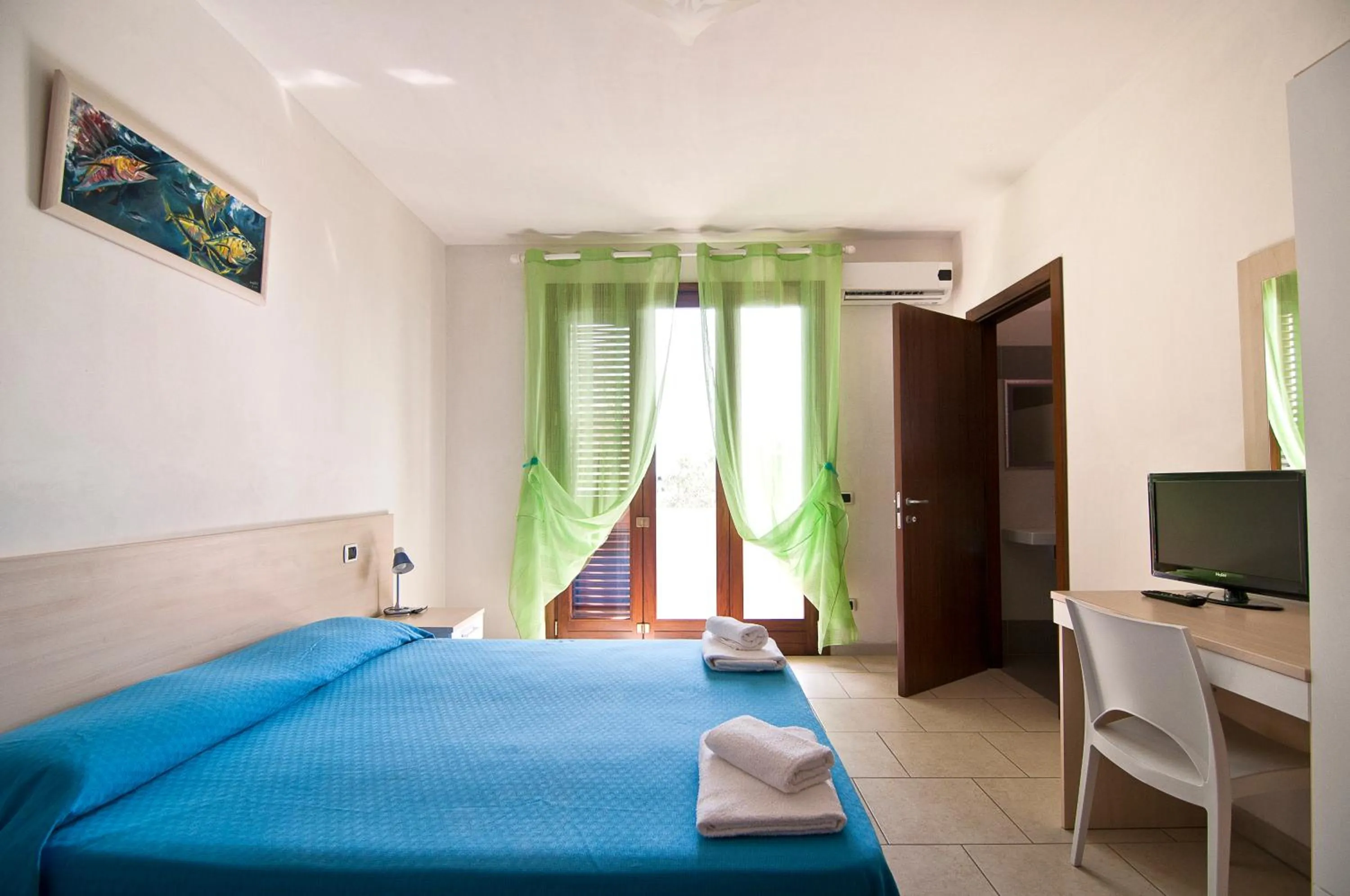 Photo of the whole room in Giardino Dei Suoni B&B