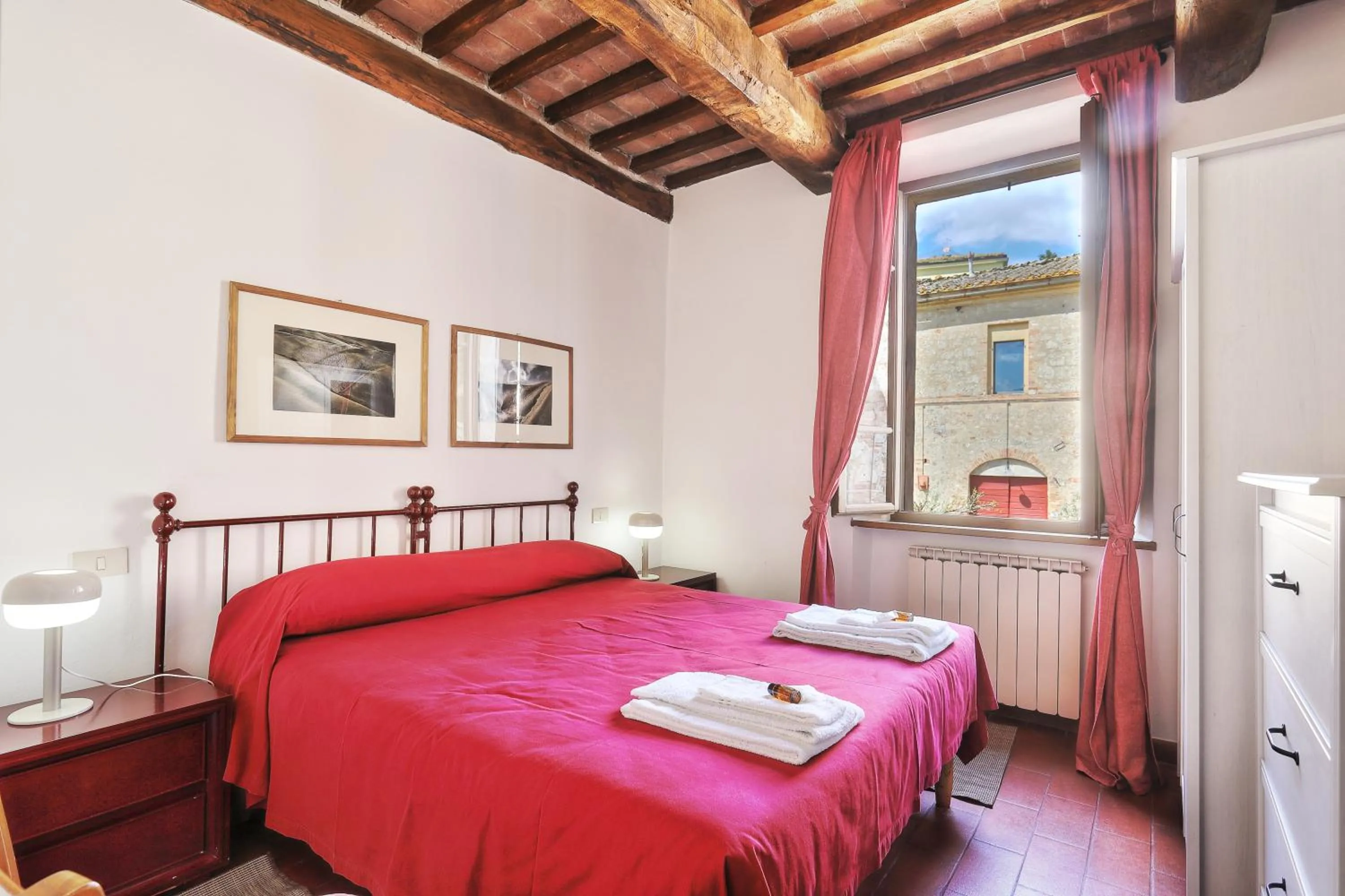 Bedroom, Bed in Appartamenti Villa e Fattoria di Radi Tuscany