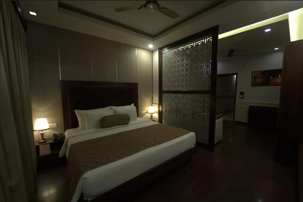 Bed in Hotel JSR Continental