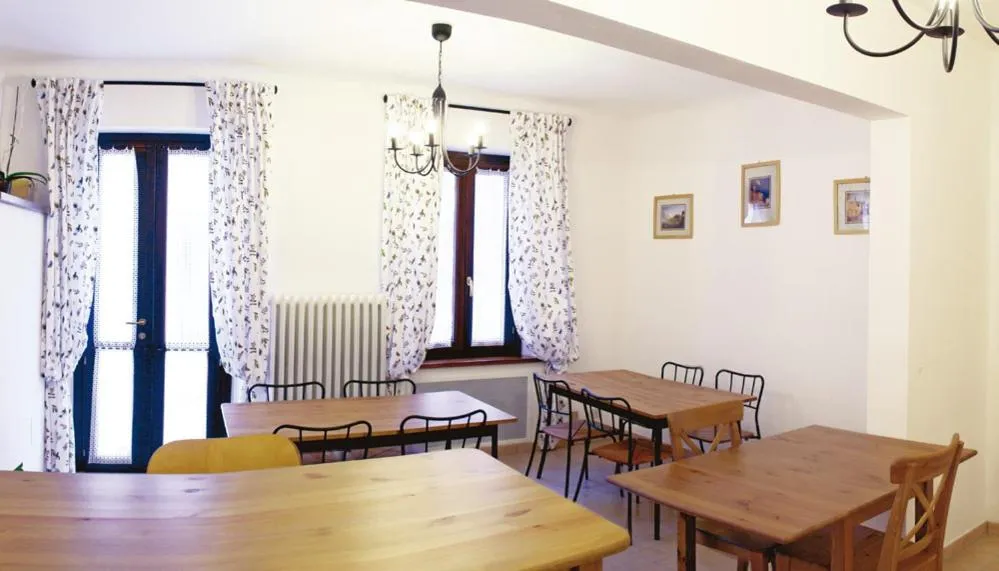 Communal lounge/ TV room in B&B Indipendenza