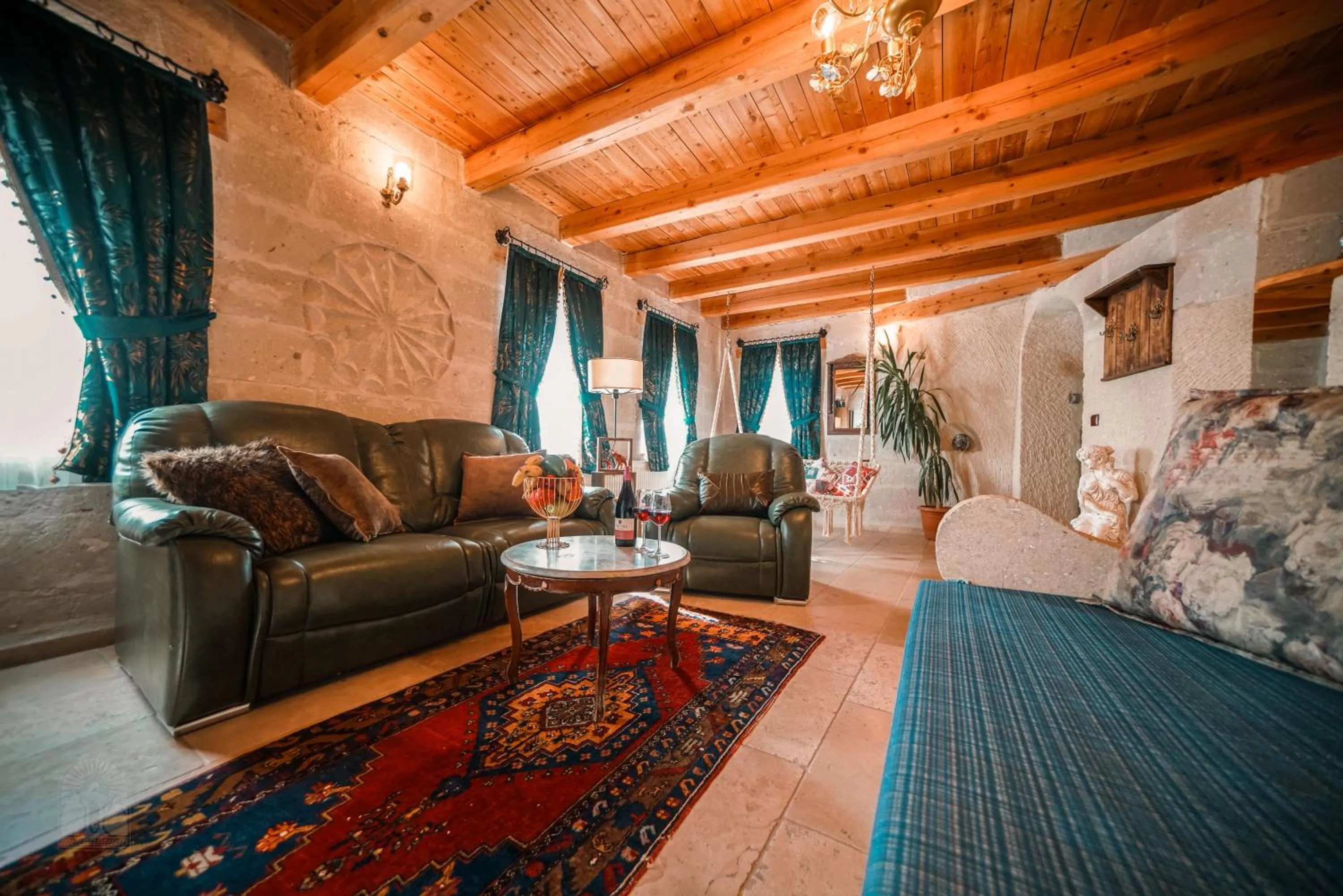 Seating area in Zeus Cave Suites