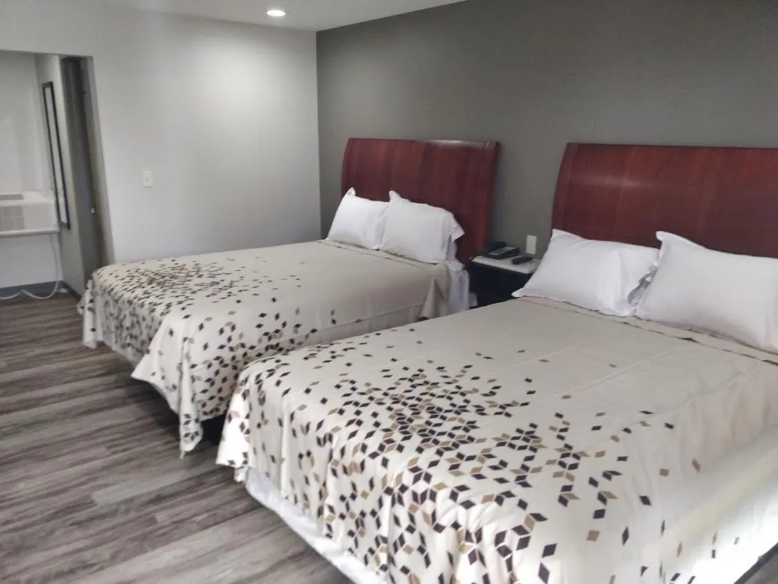 Bed in BEL AIR MOTEL