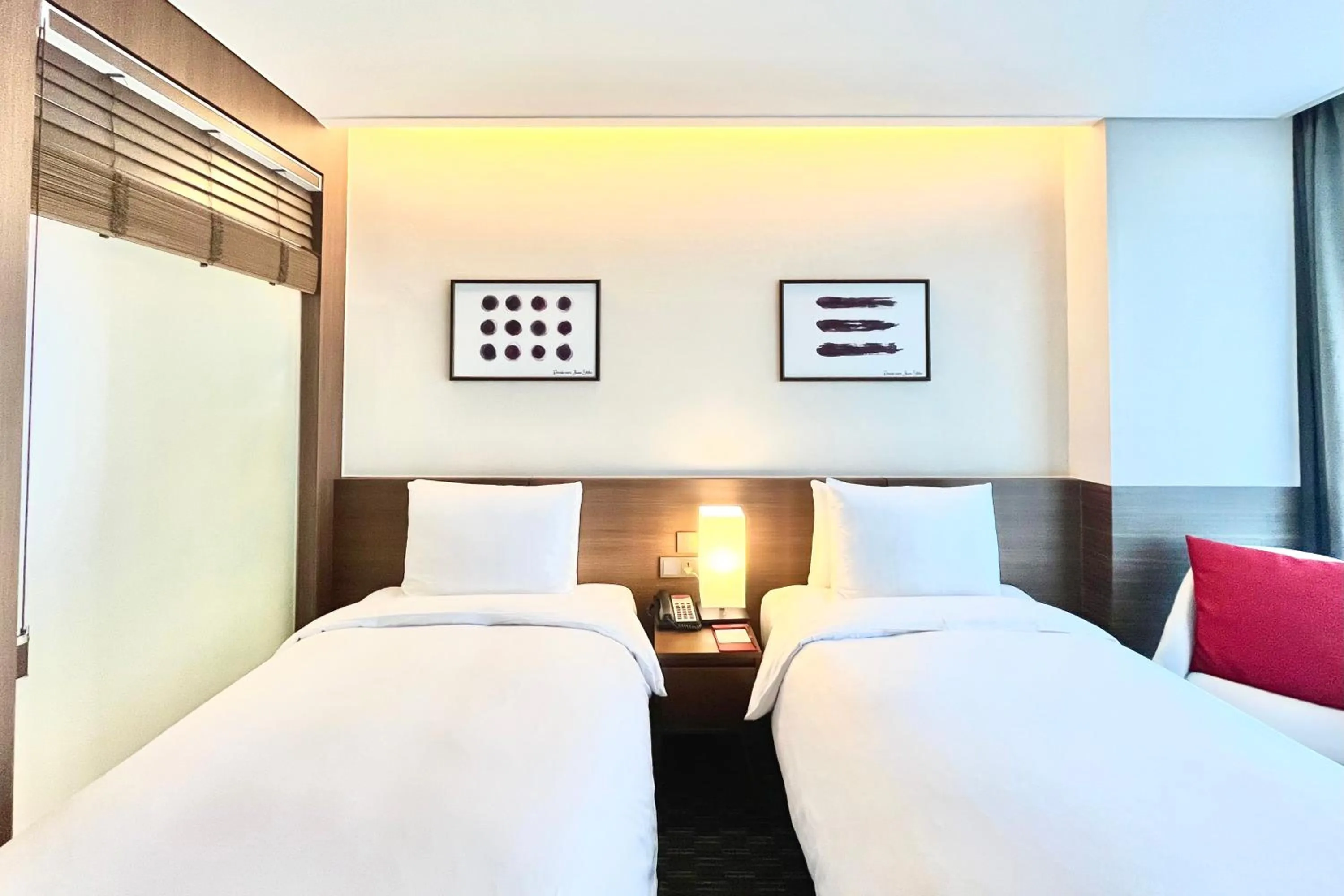 Bed in Ramada Encore by Wyndham Busan Station