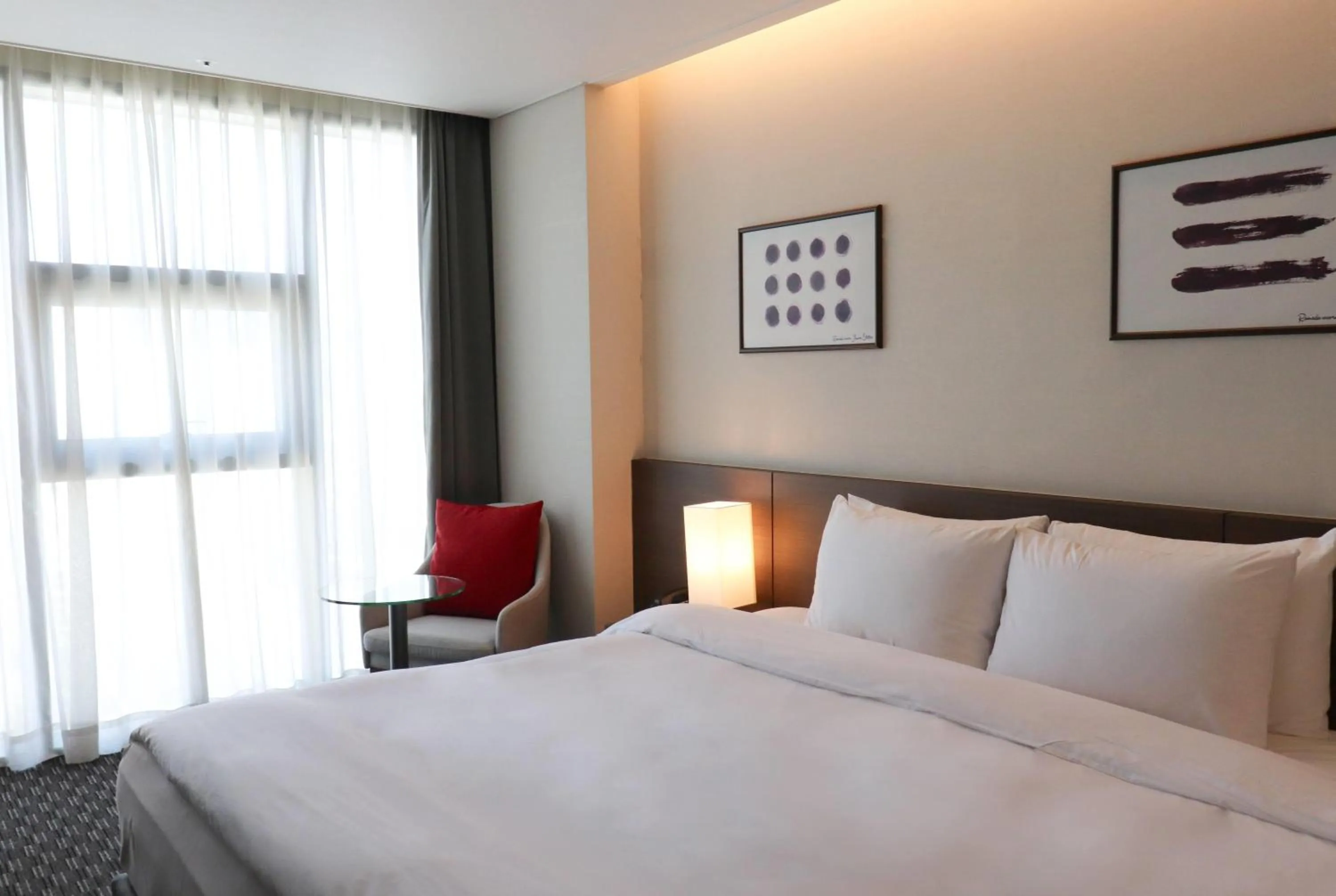 Photo of the whole room, Bed in Ramada Encore by Wyndham Busan Station