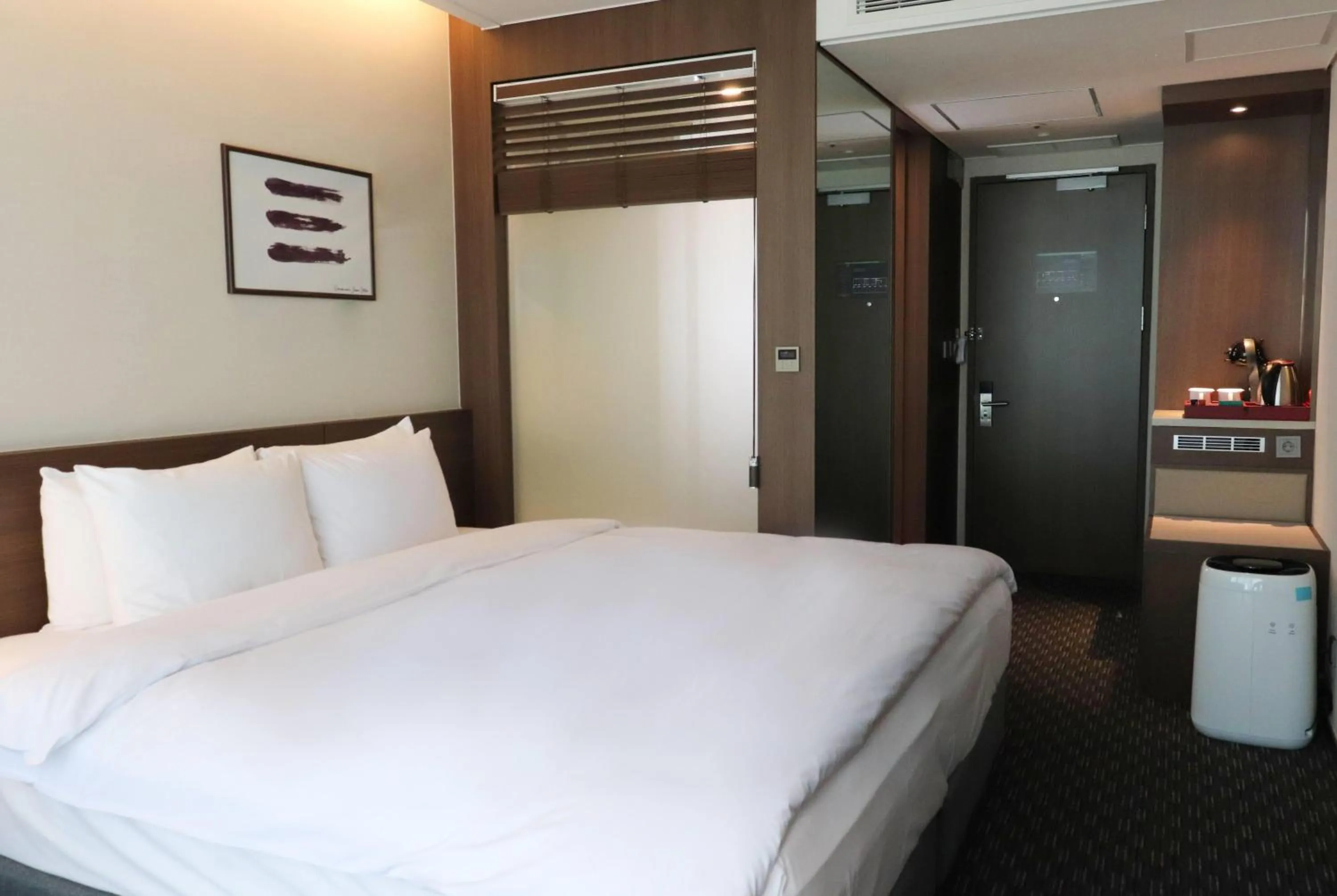 Photo of the whole room, Bed in Ramada Encore by Wyndham Busan Station