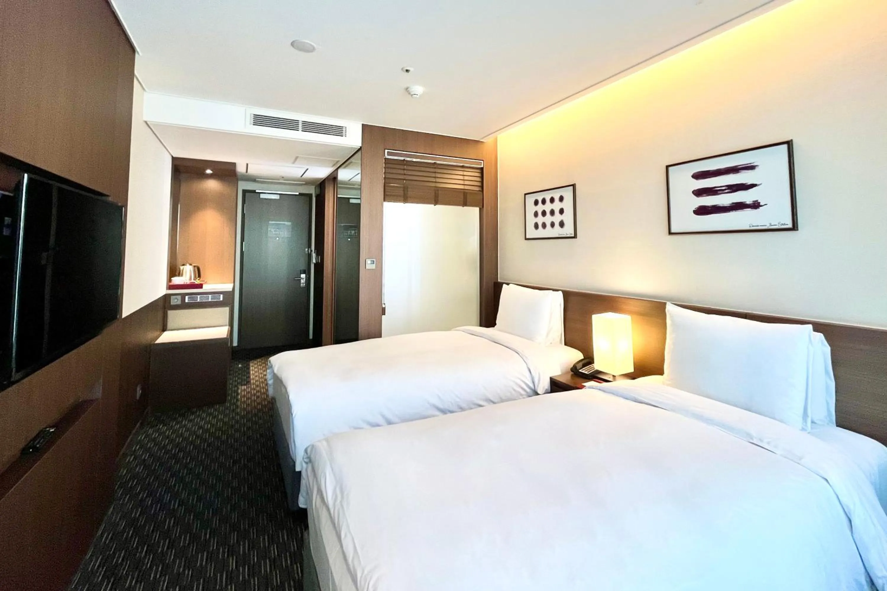 Bed in Ramada Encore by Wyndham Busan Station