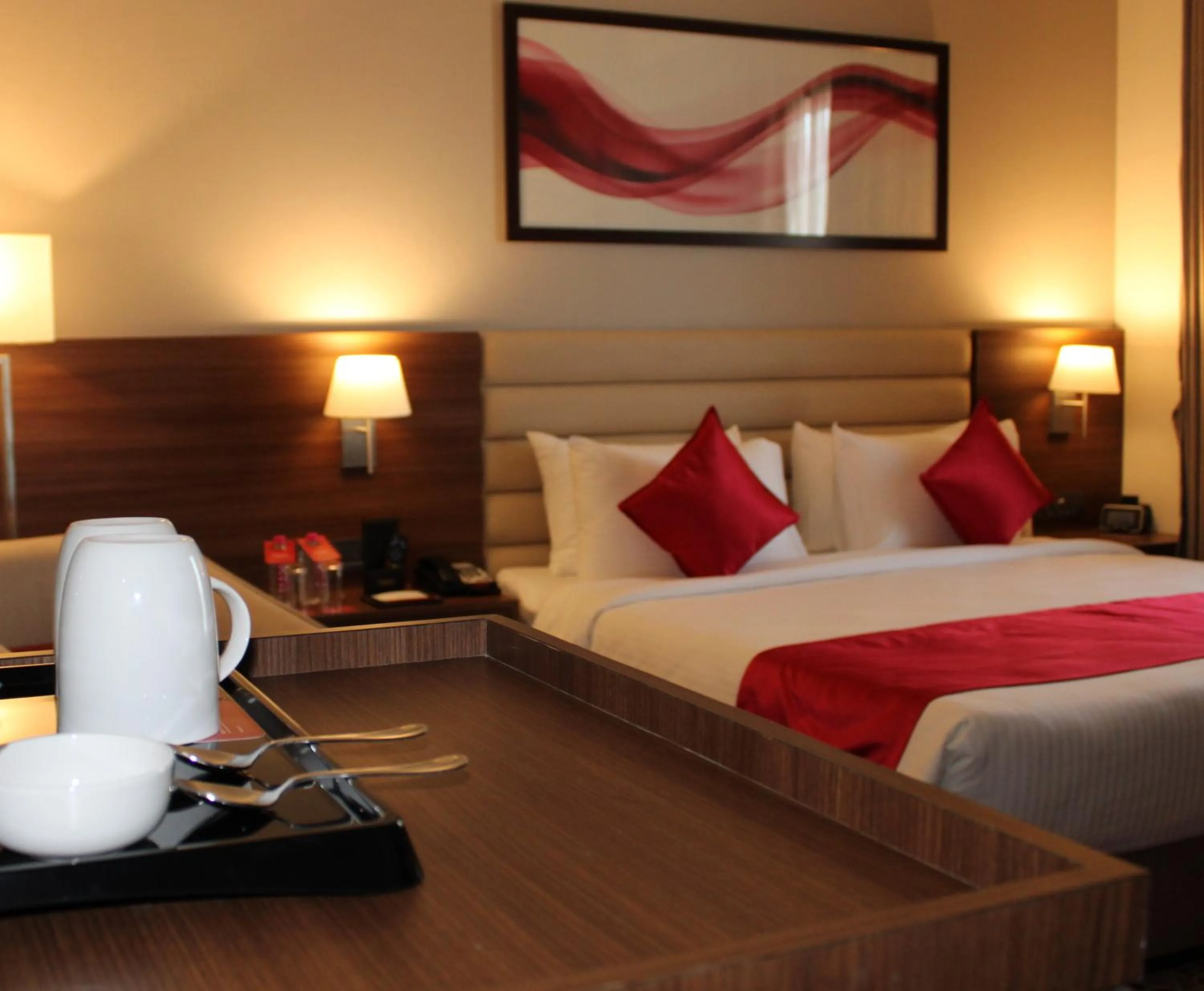 Bedroom, Bed in Ramada by Wyndham Gandhidham Shinay