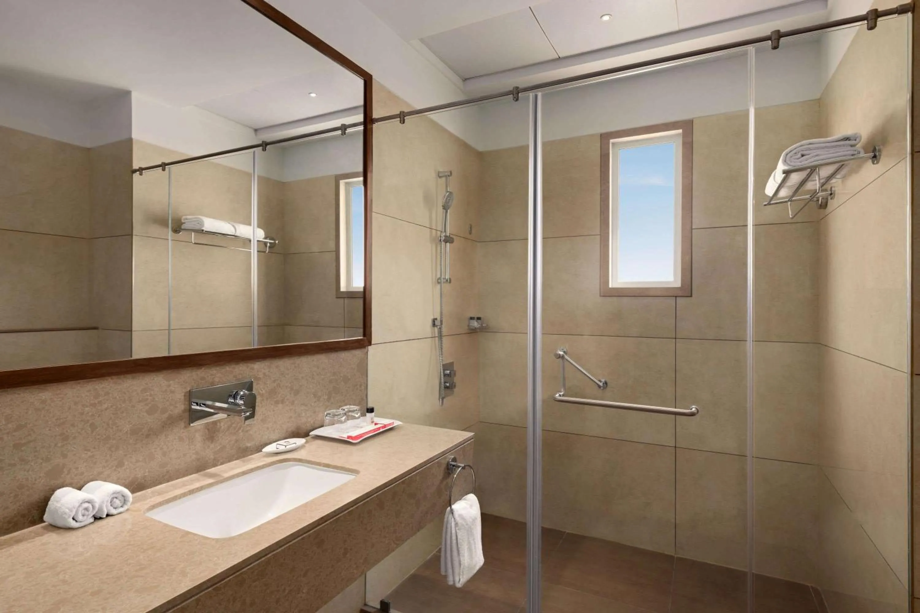 Shower in Ramada by Wyndham Gandhidham Shinay