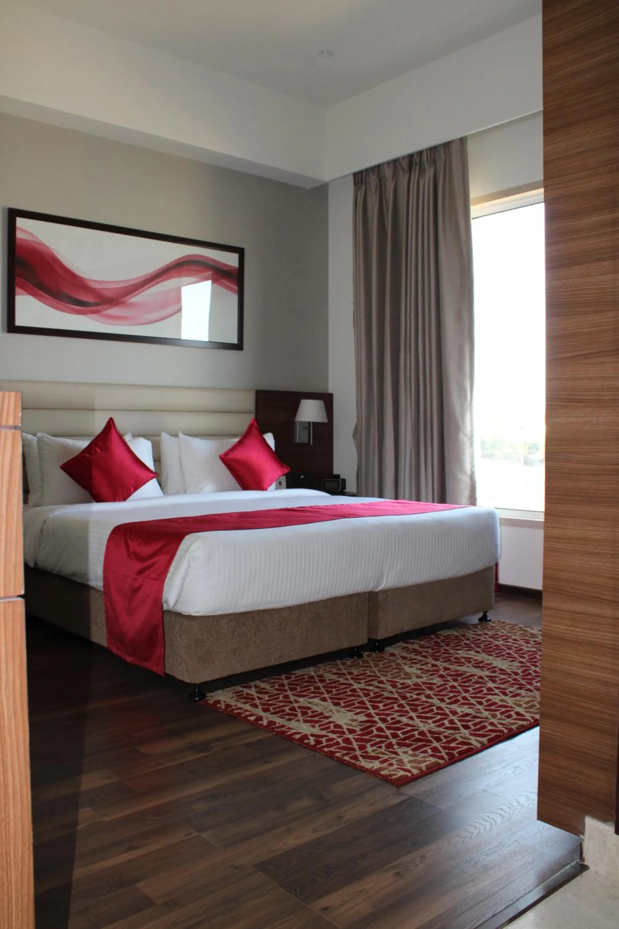 Bedroom, Bed in Ramada by Wyndham Gandhidham Shinay