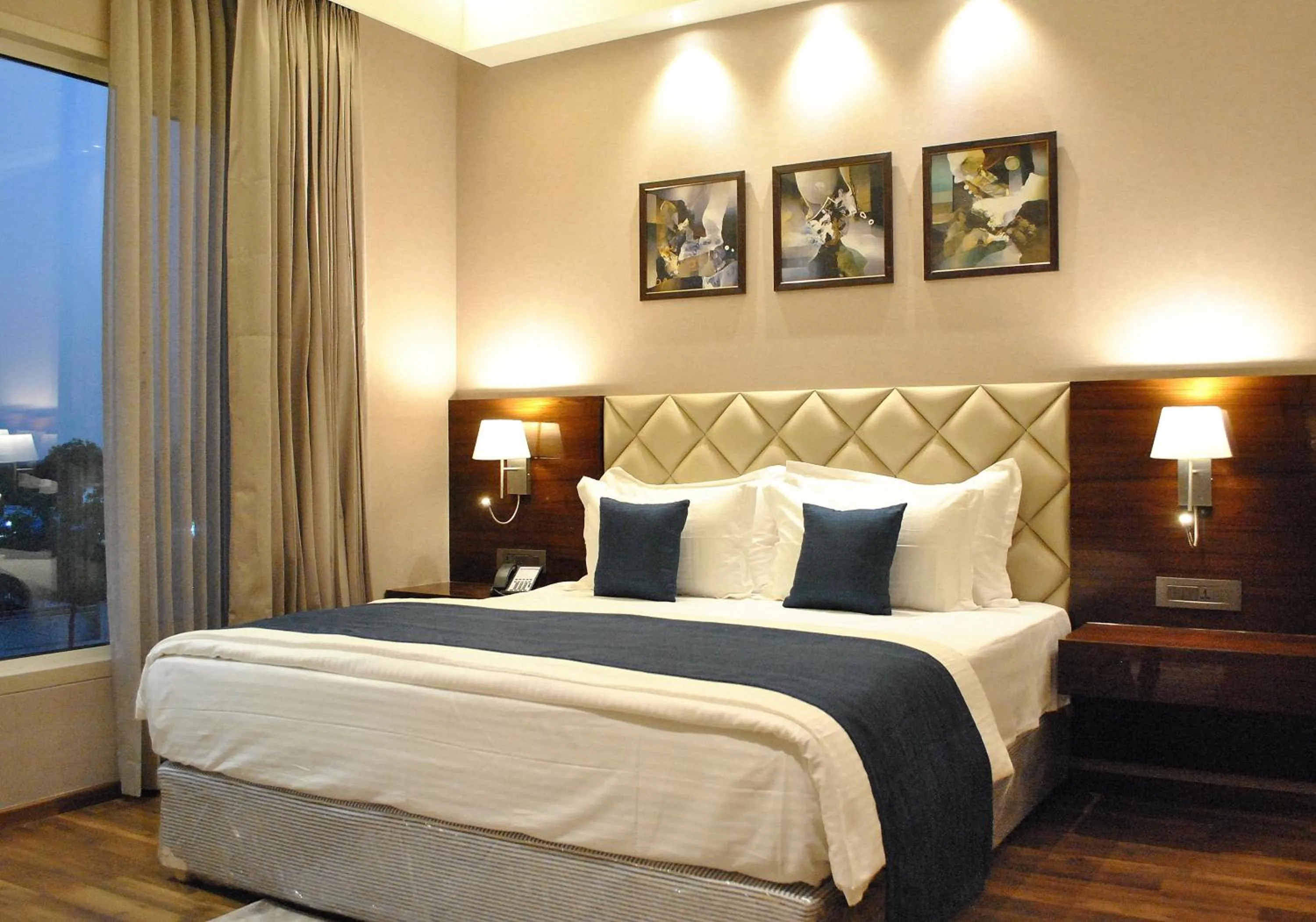 Bedroom, Bed in Ramada by Wyndham Gandhidham Shinay