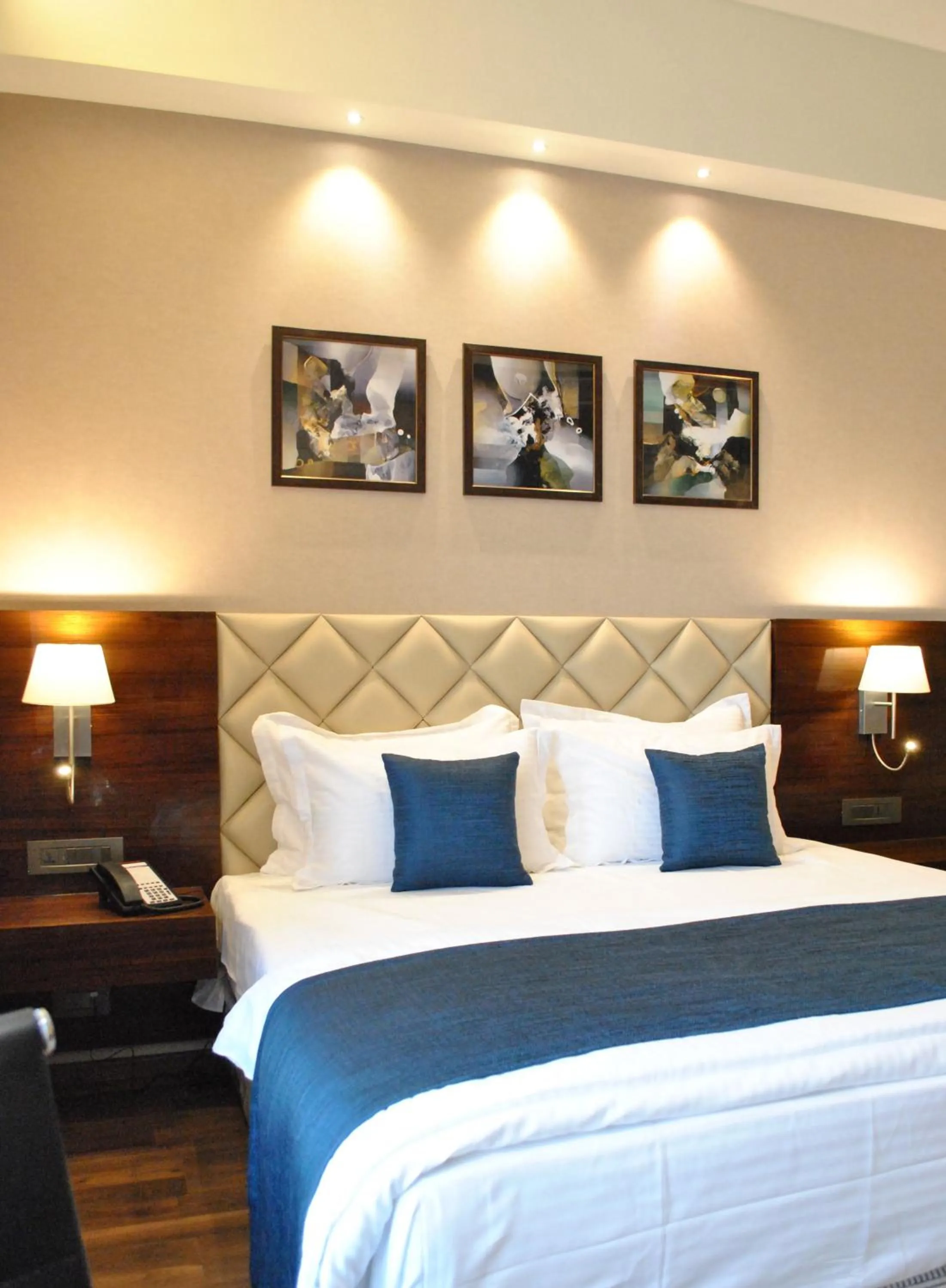 Bedroom, Bed in Ramada by Wyndham Gandhidham Shinay