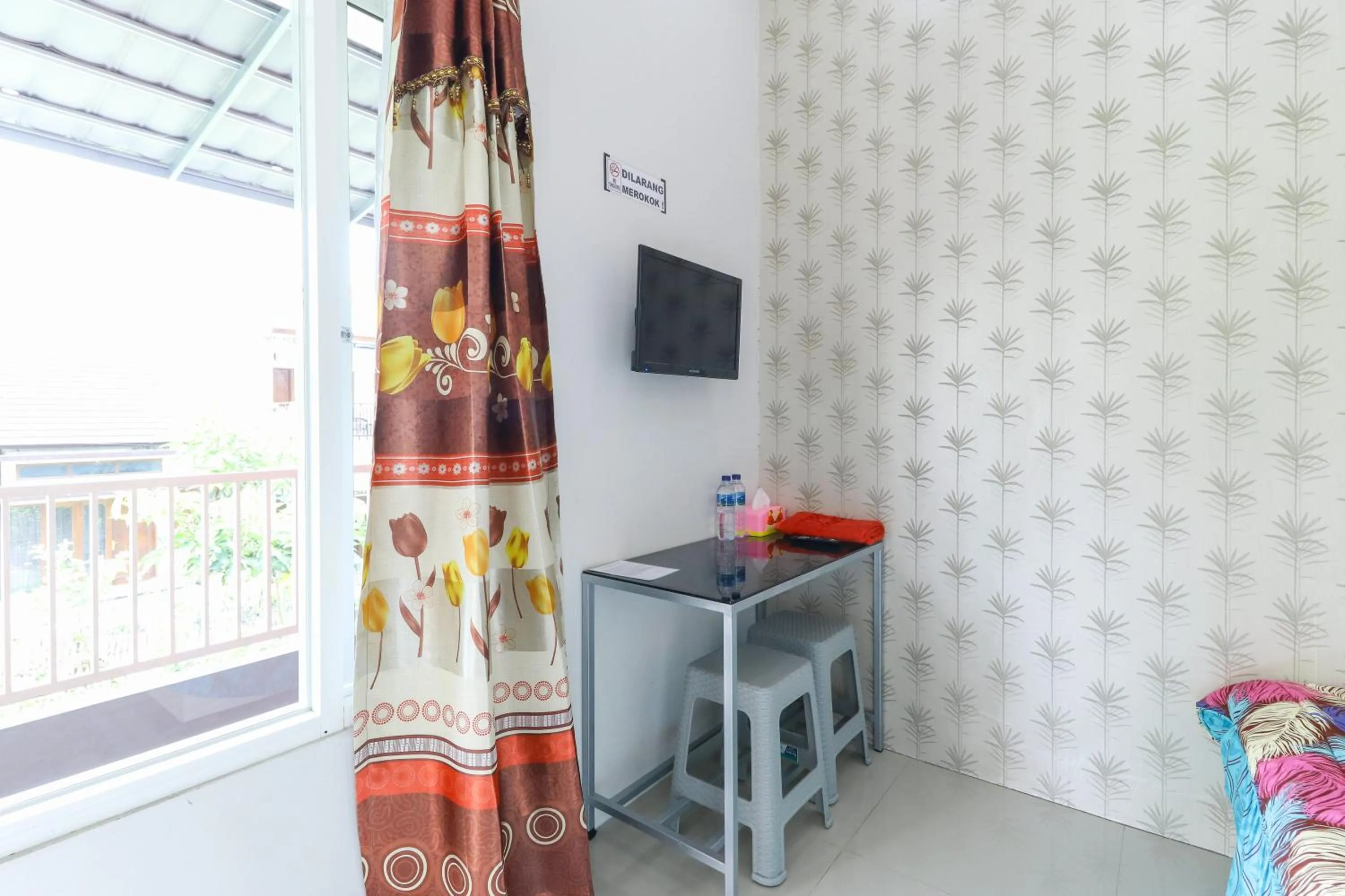 Bedroom in Griya Mulya near Alun Alun Batu Mitra RedDoorz
