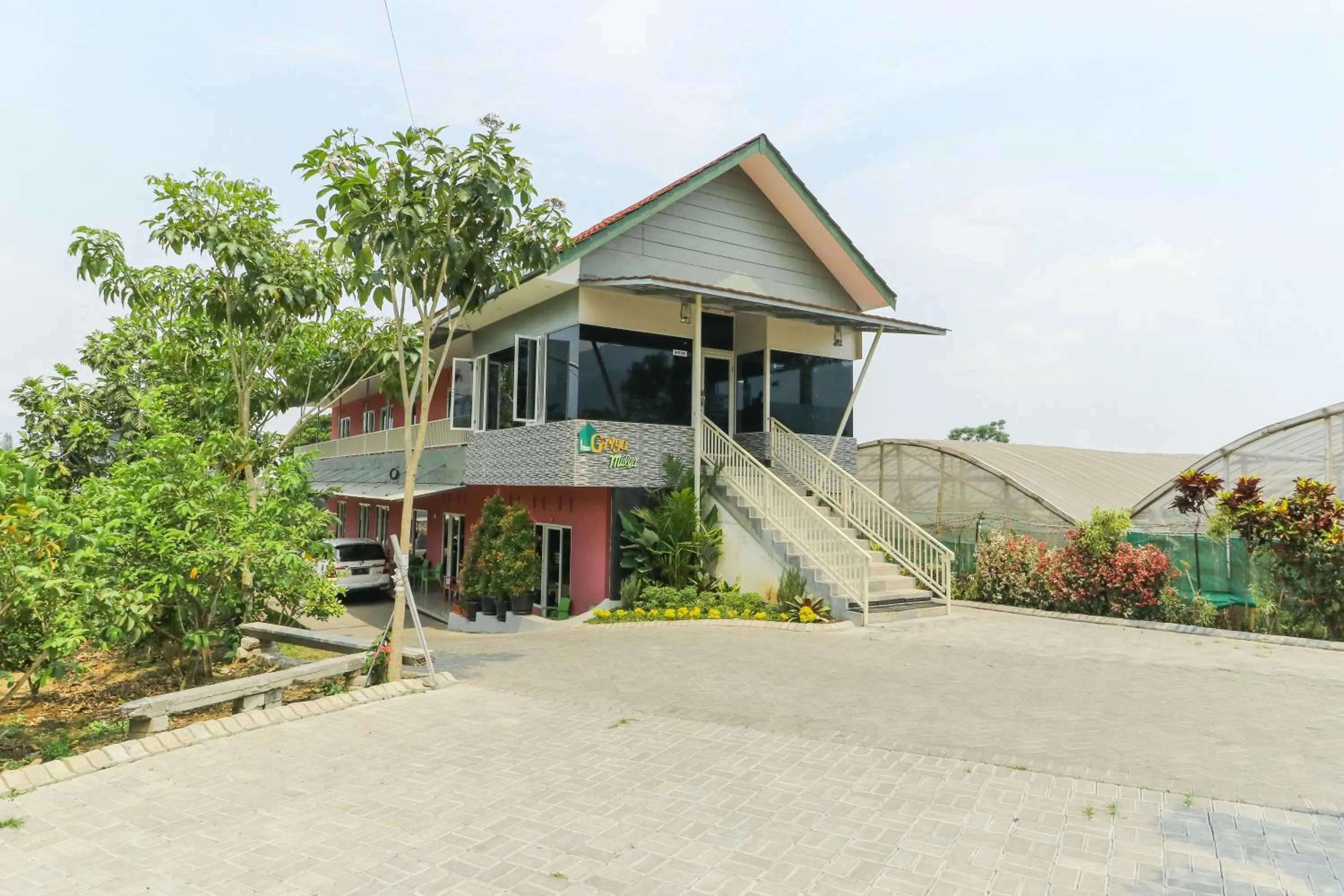 Facade/entrance in Griya Mulya near Alun Alun Batu Mitra RedDoorz