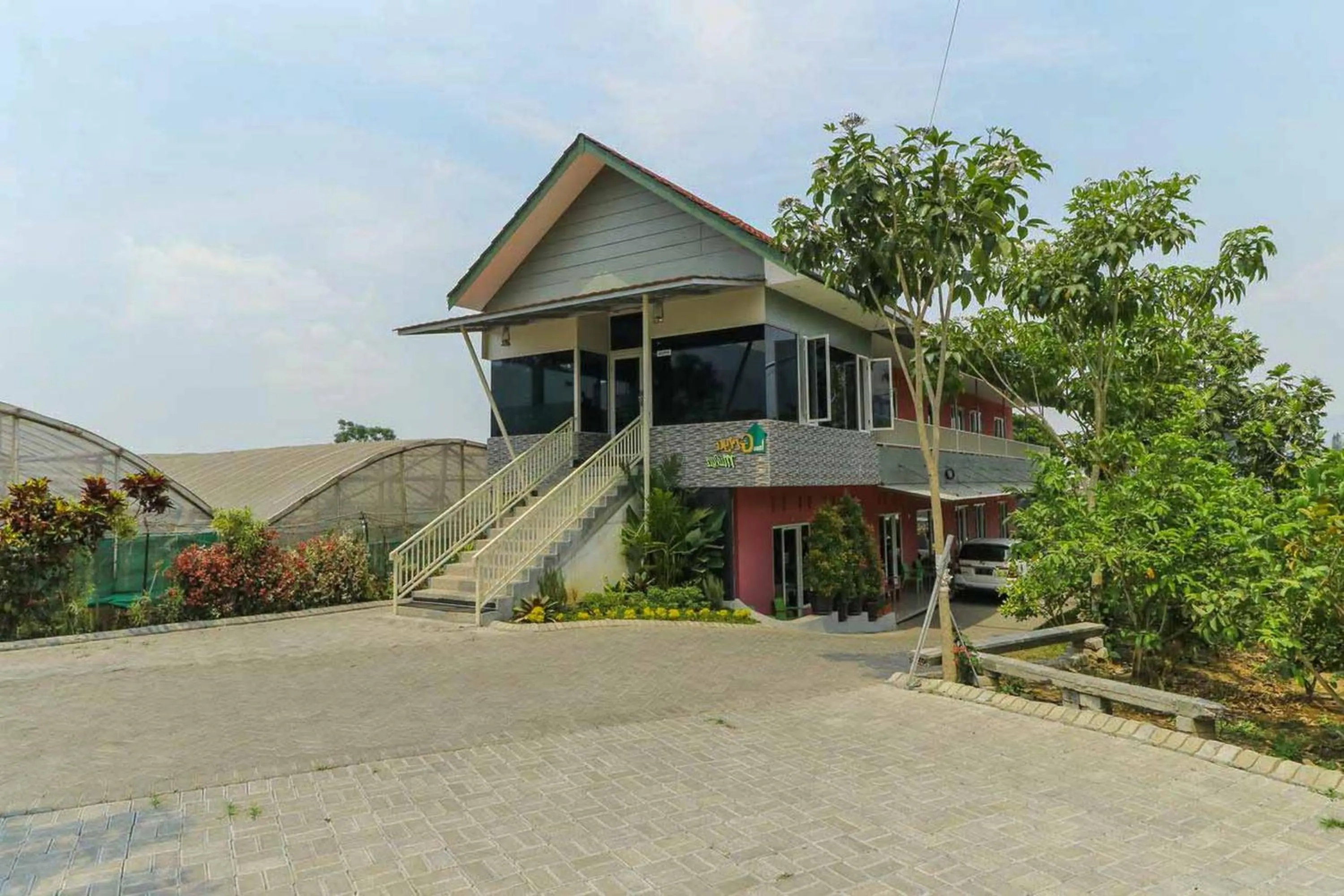 Facade/entrance in Griya Mulya near Alun Alun Batu Mitra RedDoorz