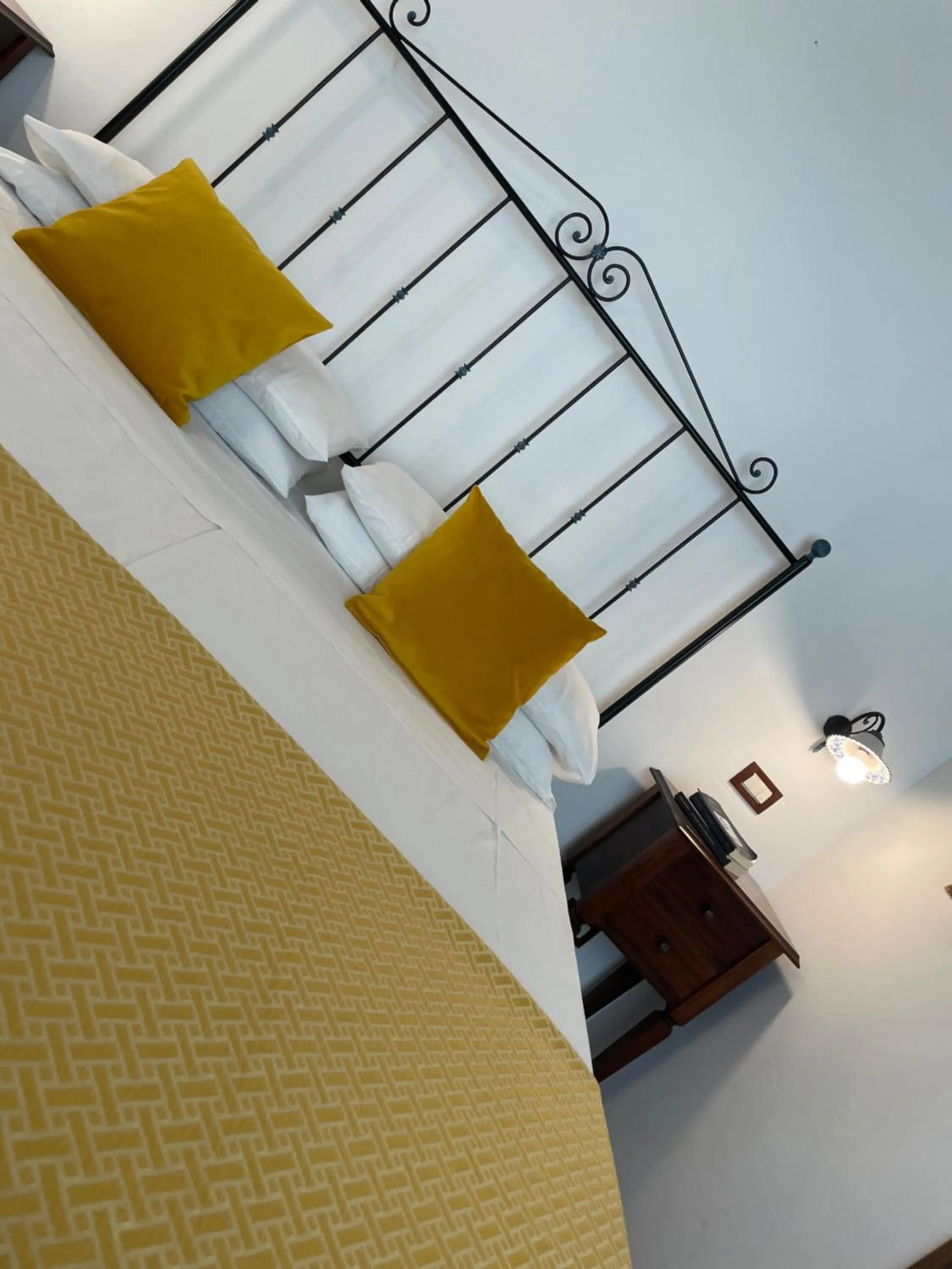 Bed in Ai Dammusi Rooms