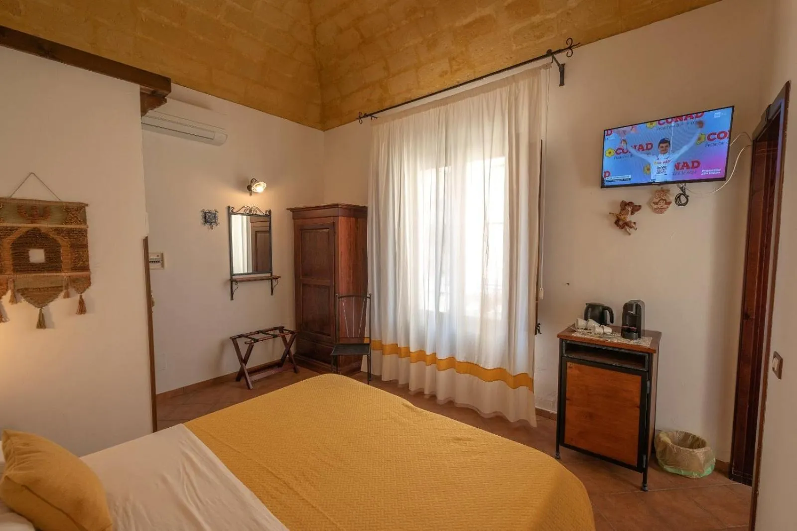 Bed in Ai Dammusi Rooms