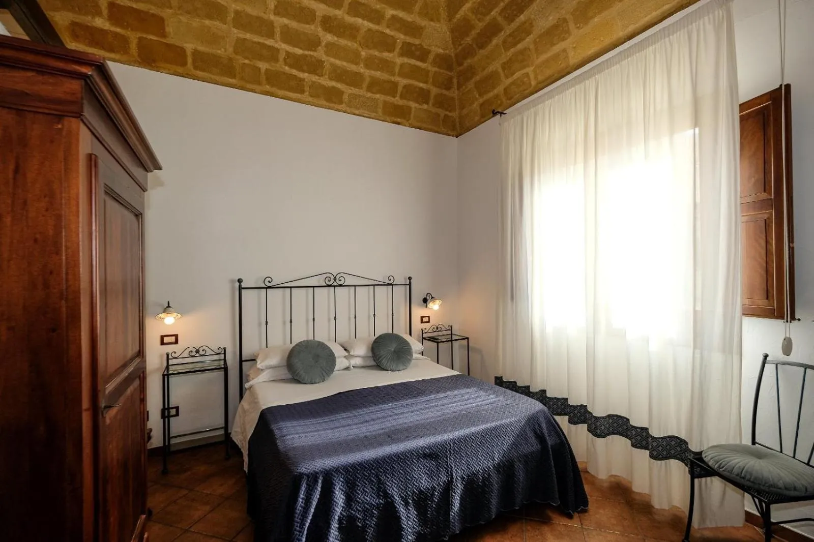 Bed in Ai Dammusi Rooms