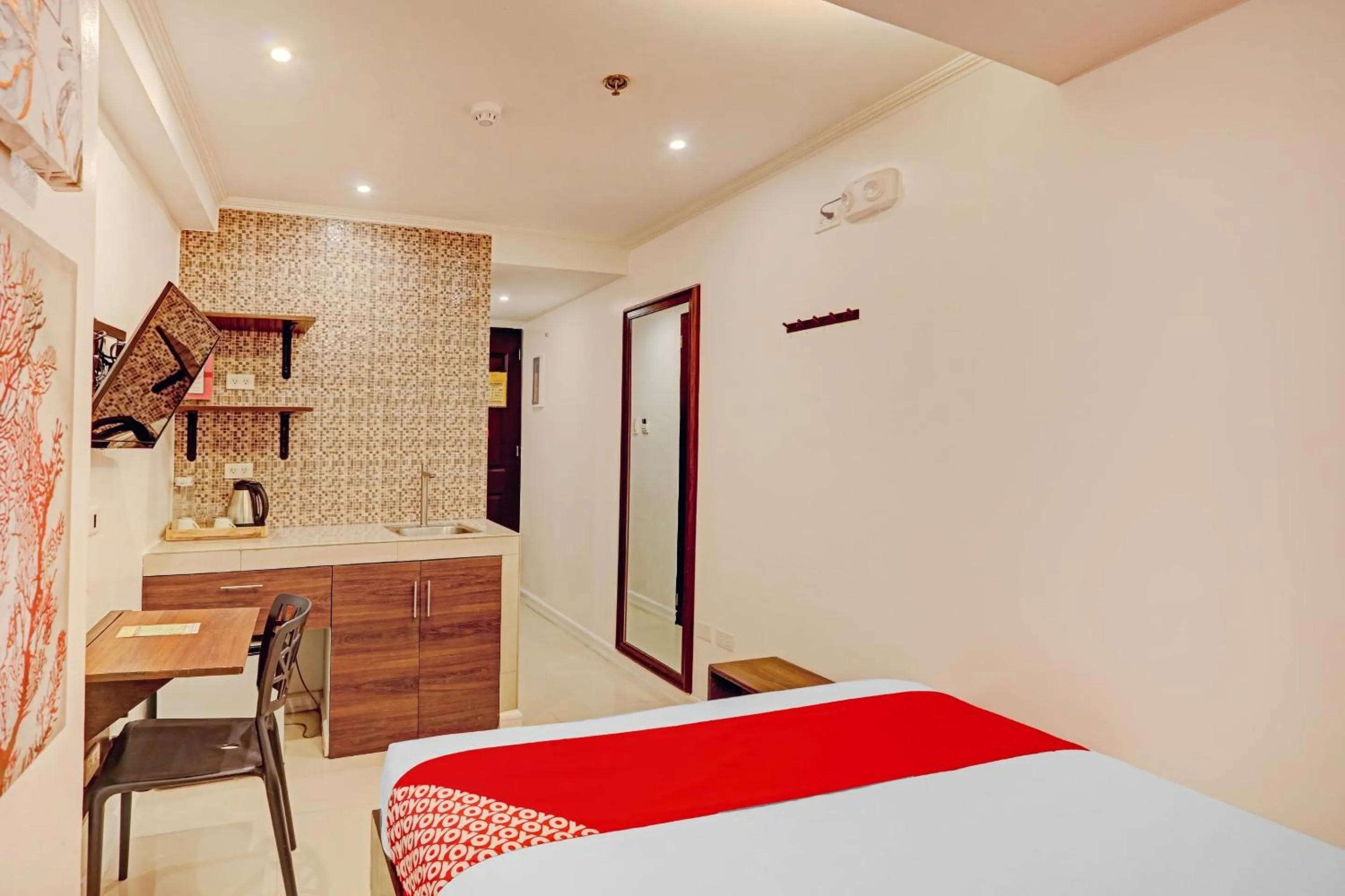 Bedroom in Super OYO Capital O 232 Nest Nano Suites Fort