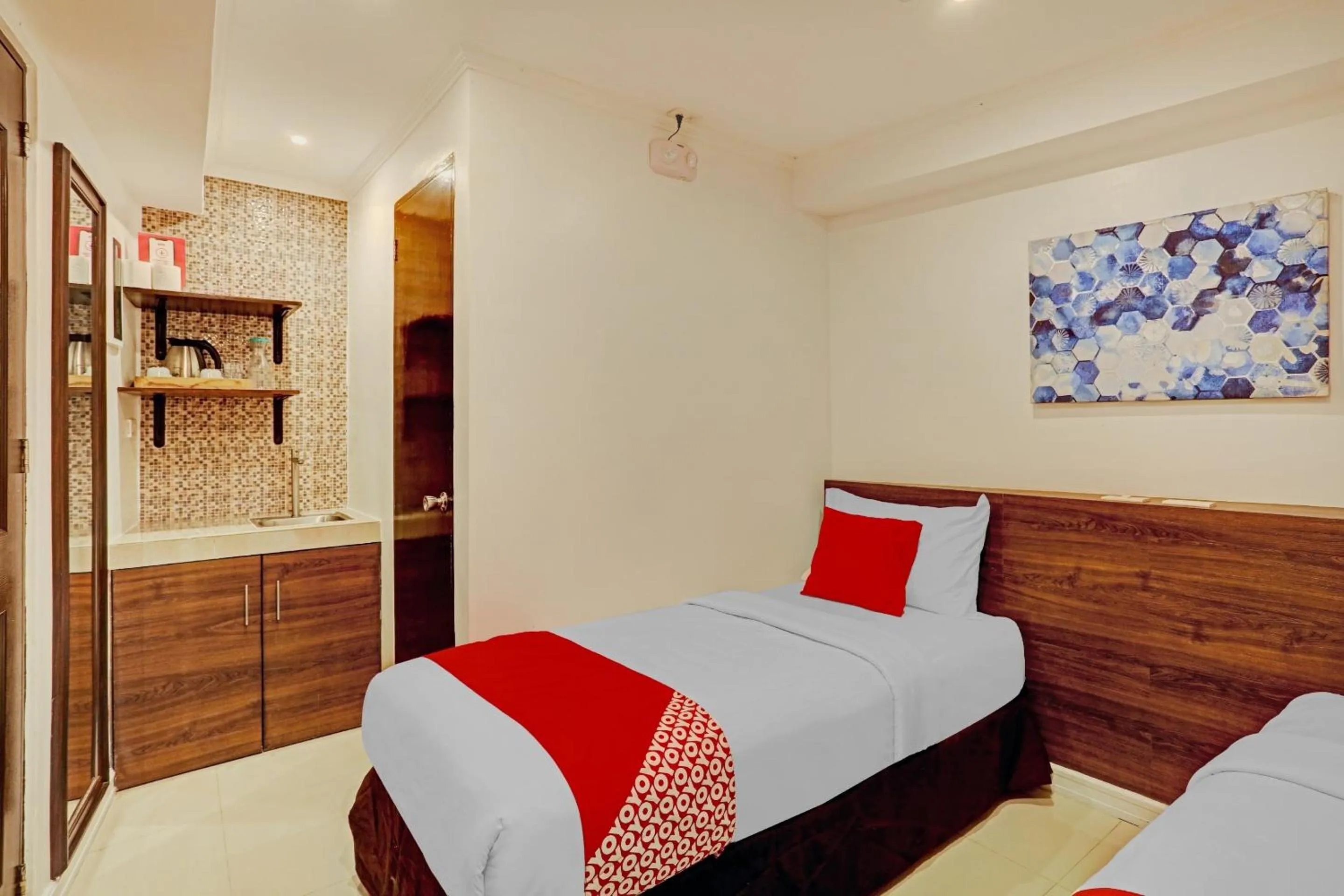 Bedroom in Super OYO Capital O 232 Nest Nano Suites Fort