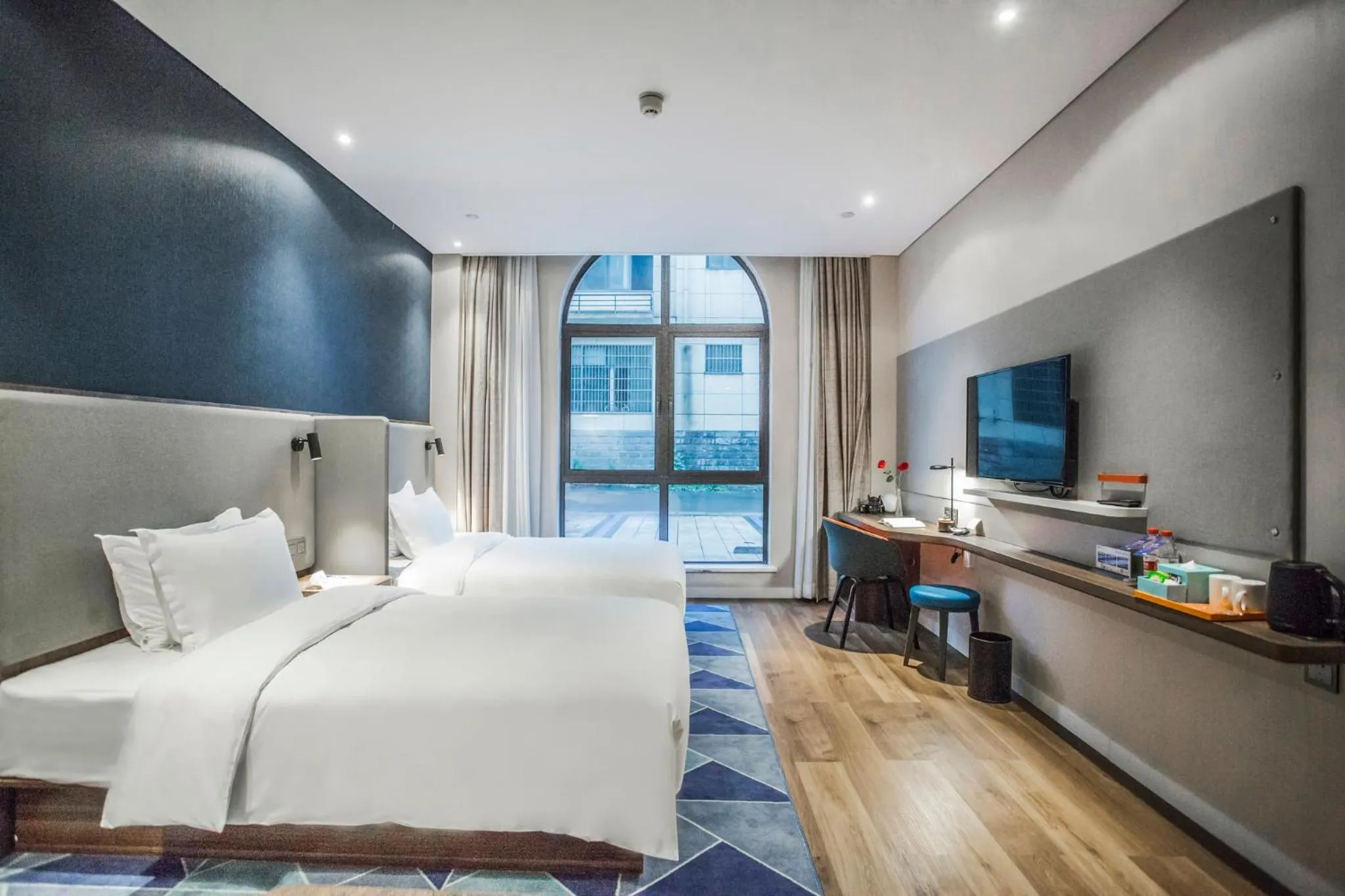 Photo of the whole room, Bed in Holiday Inn Express Hangzhou Xixi Tourism Zone by IHG