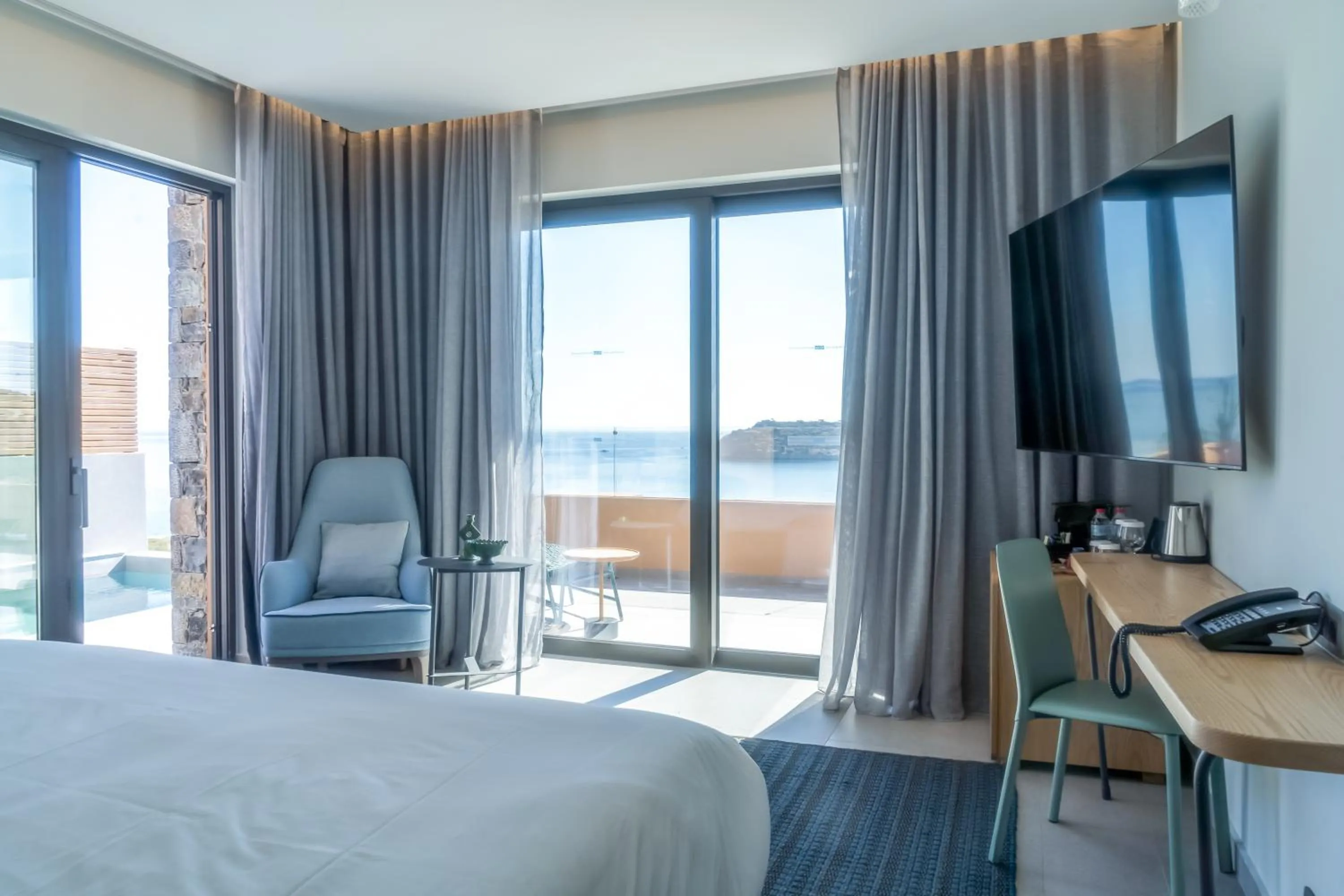 Bed in Cayo Exclusive Resort & Spa